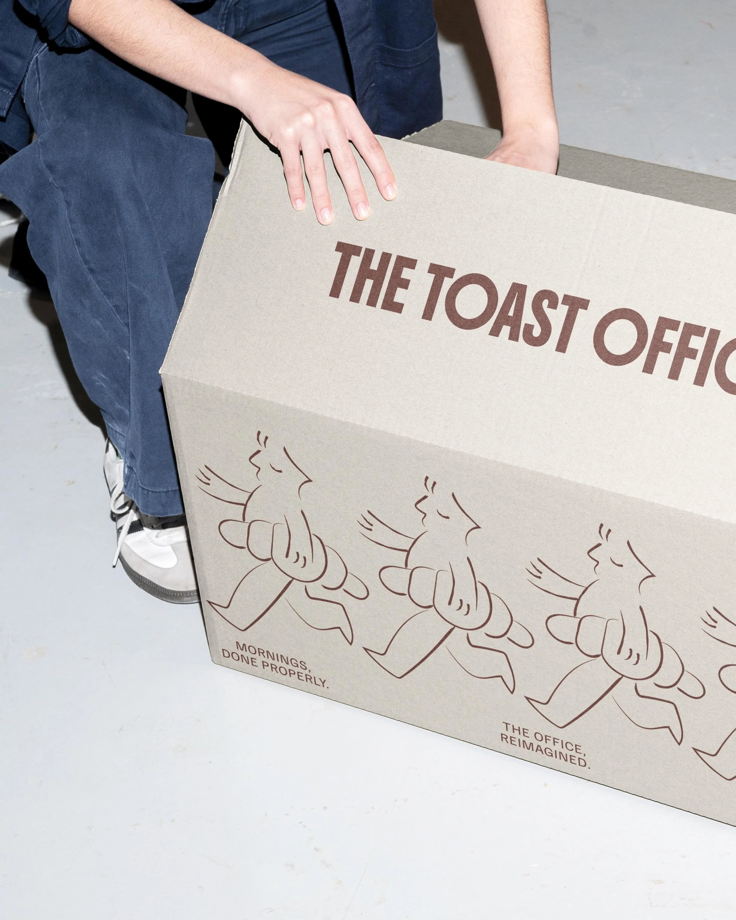 The TTO packaging was designed to carry the brand beyond the space.

We treated it like a moving touchpoint, something that holds the same level of clarity and personality once it leaves the counter.

A simple, uncoated box becomes the canvas. Strong