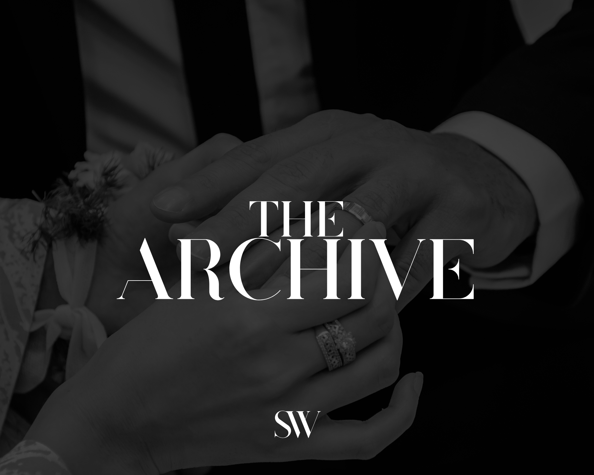Close-up of a man and woman holding hands, with wedding rings visible, overlaid with the text 'The Archive'.