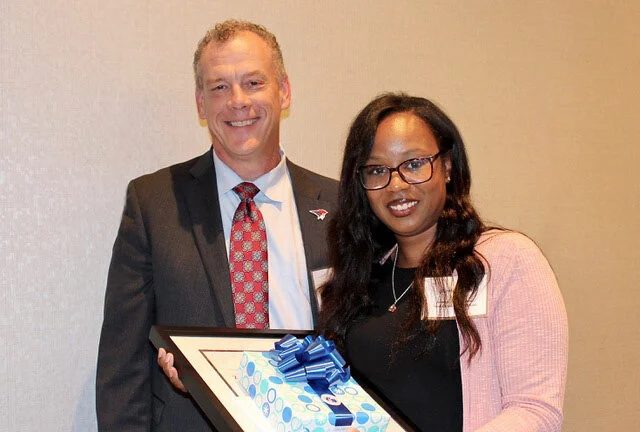 Dr. Jack Thompson (left), MHJF Distribution Committee member and Superintendent of Perry Schools presents the ‘21 Master Teacher Award to Shanti Coaston (right), computer tech, Shaw High School, East Cleveland City Schools. Her teaching strategies a…