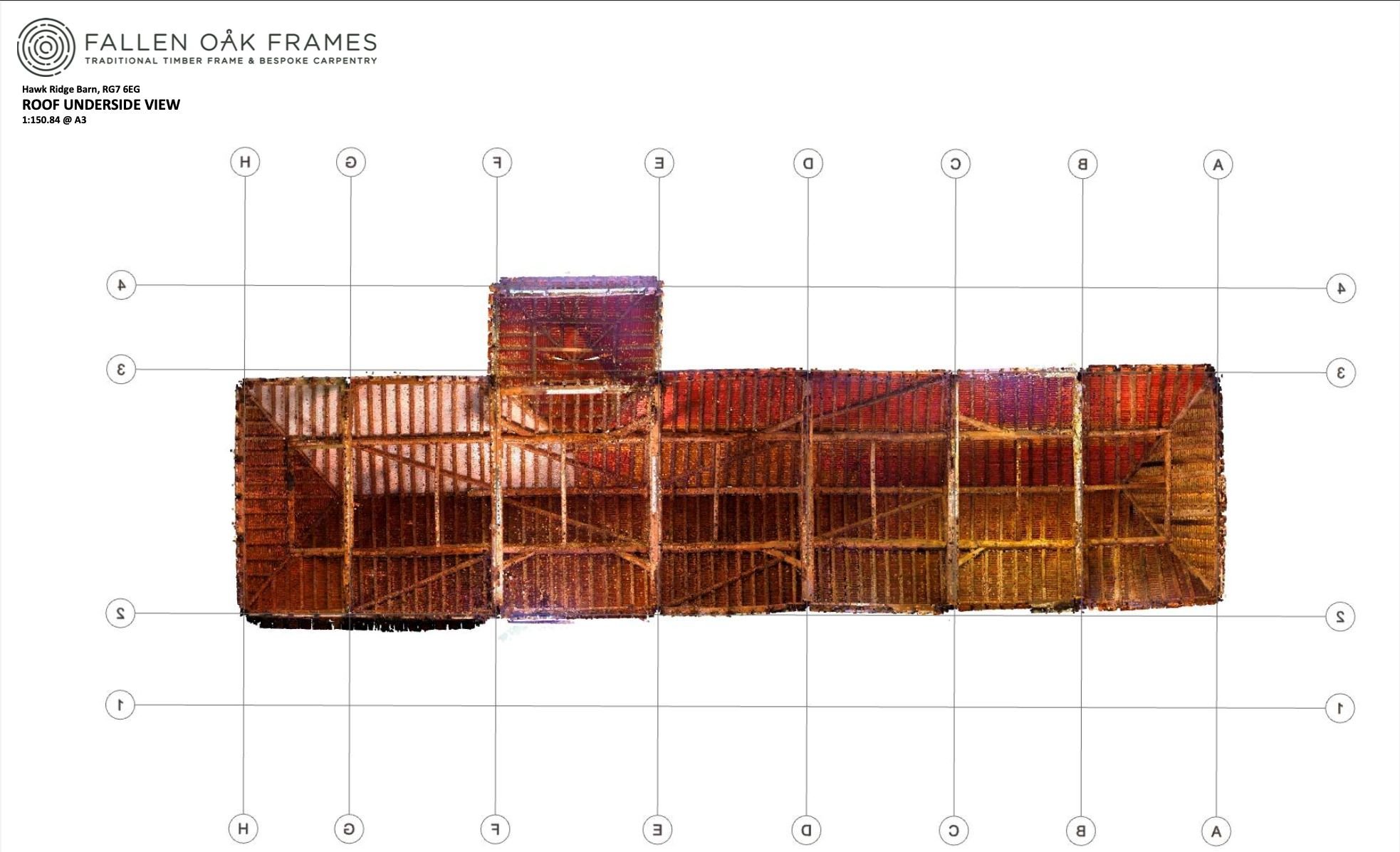 Underside view of a wooden barn roof with a small elevated section, showing the structure and wooden beams.