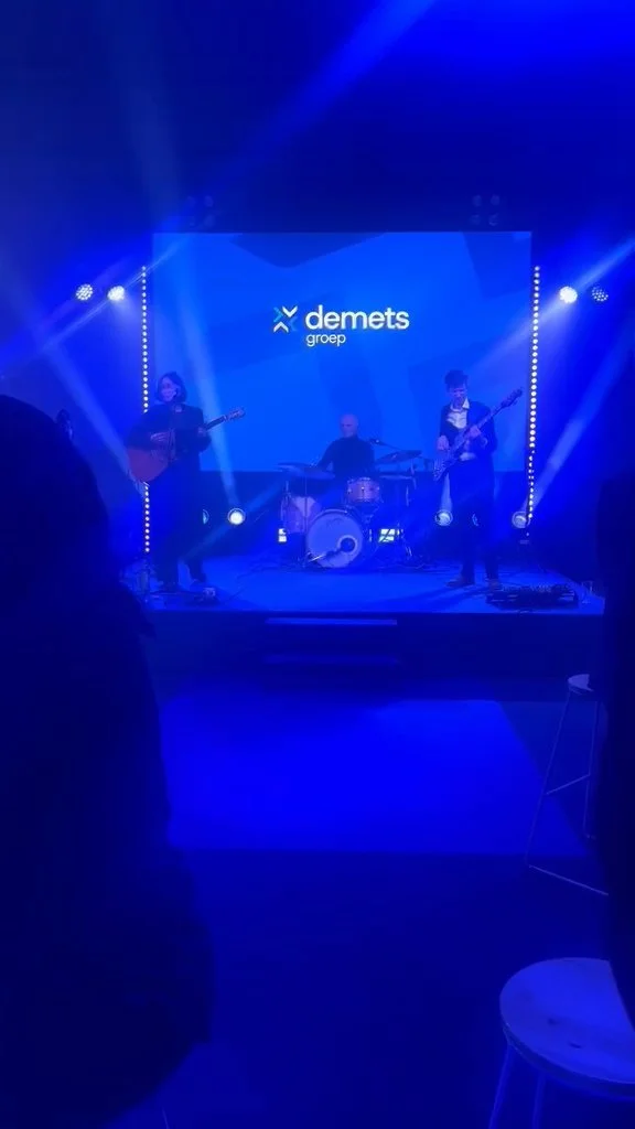 Trio band playing at a corporate event