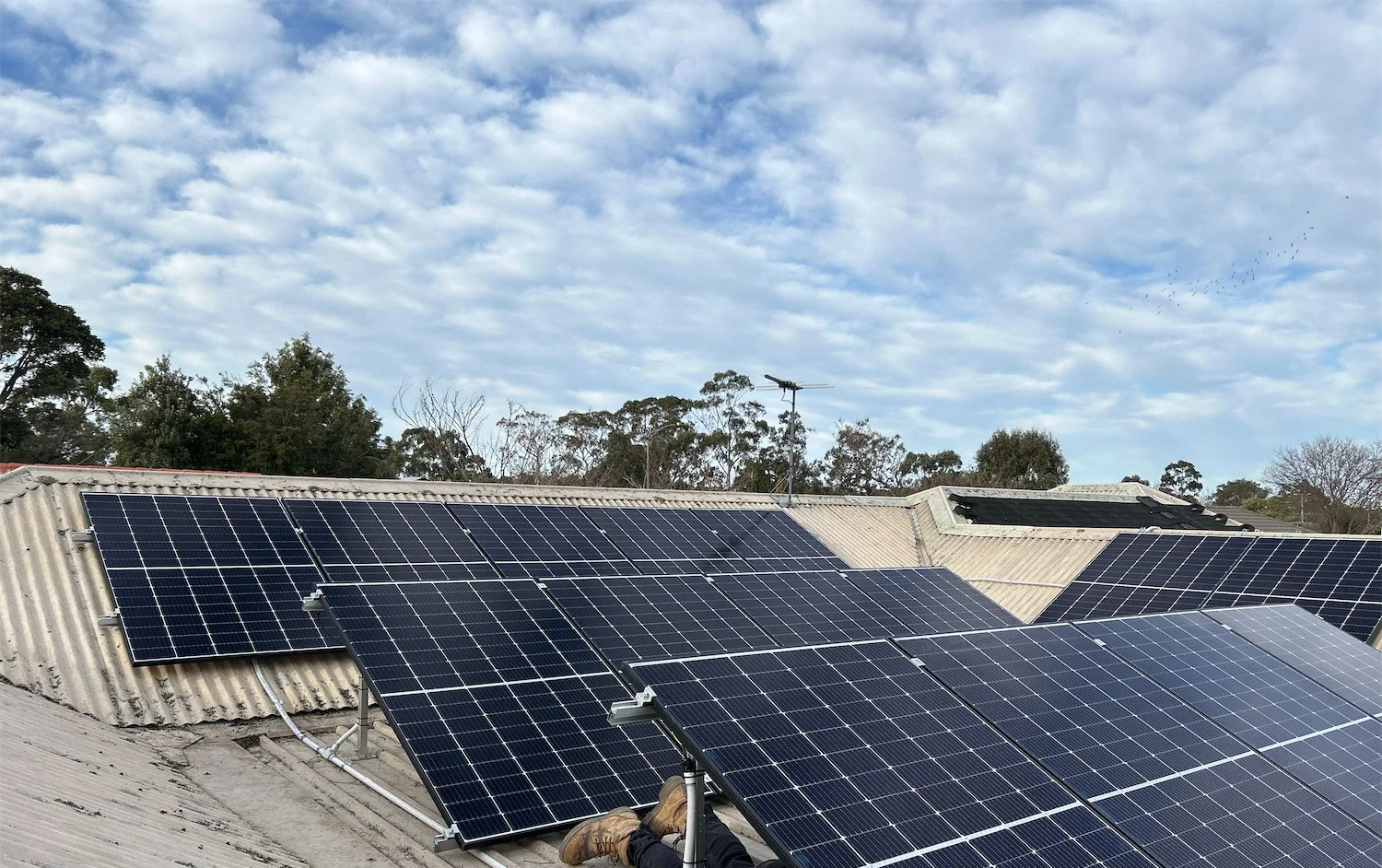 Solar panels installed on a roof by Livesay Electrical in Junction Village