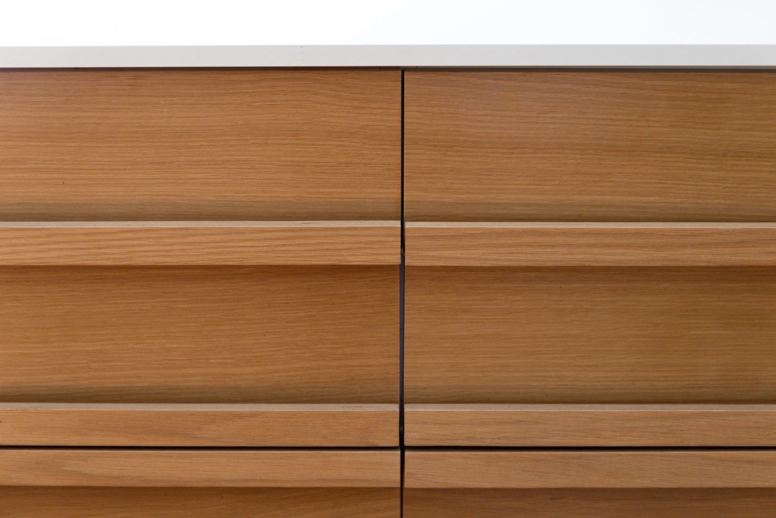 oak veneerd plywood, fenix countertop, solid oak side slats, custom made plywood handles