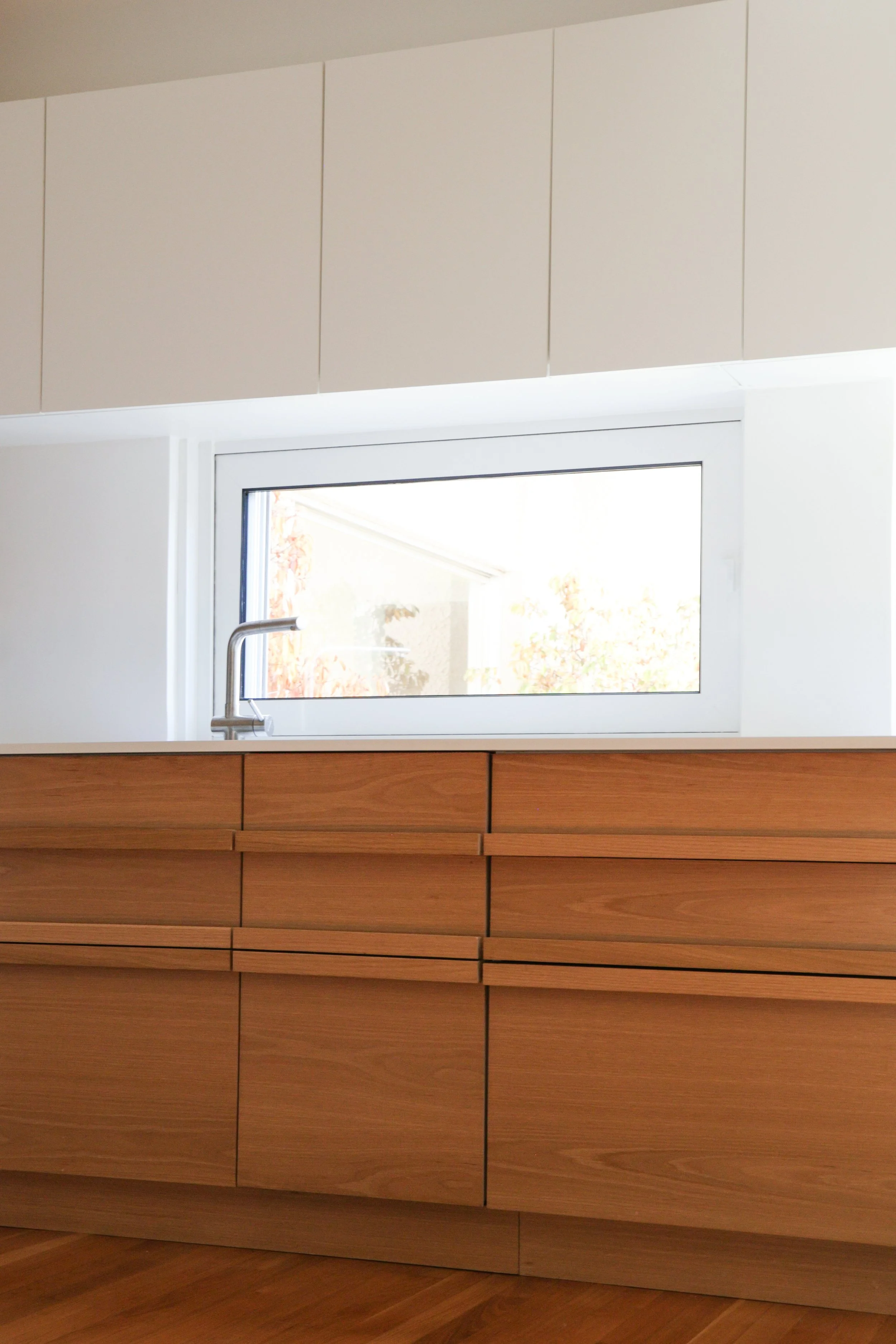 oak veneerd plywood, fenix countertop, solid oak side slats, custom made plywood handles