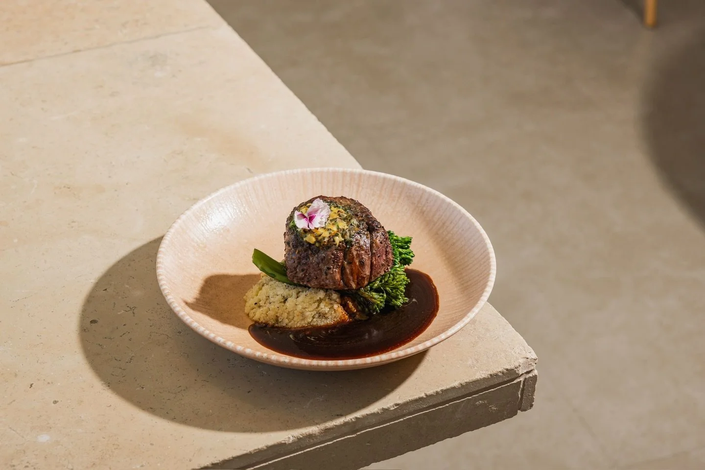 Rich, tender, and built for indulgence.

The Black Angus Eye Fillet, served with truffled white polenta, seared broccolini and caf&eacute; de paris butter, is available across both lunch and dinner service.

Dune dining at its best. Bookings availabl