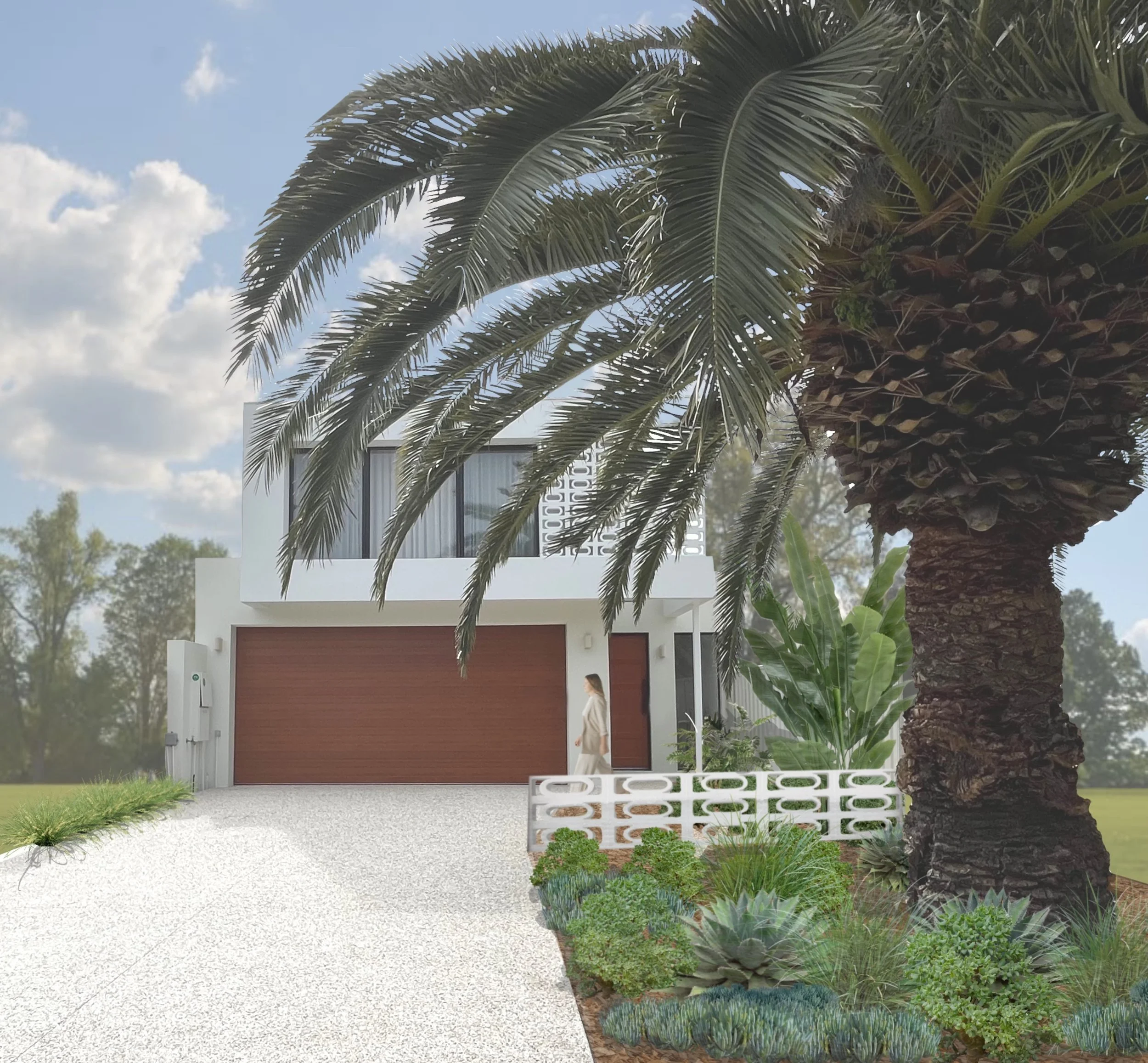 Modern white house with a brown garage door, surrounded by tropical landscaping including large palm trees and green plants, with a woman walking near the entrance.