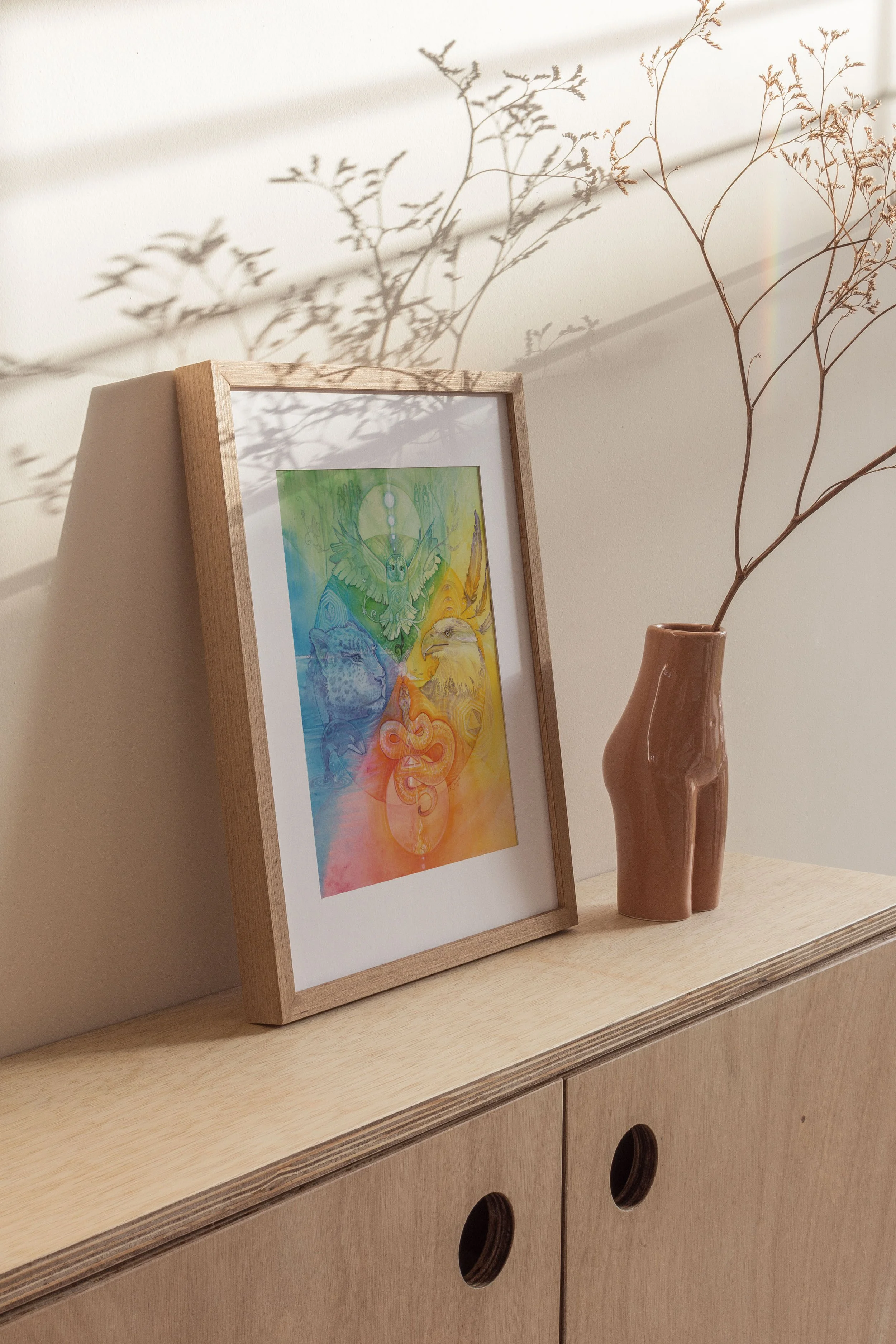 sacred directions on shelf with lady vase.jpg