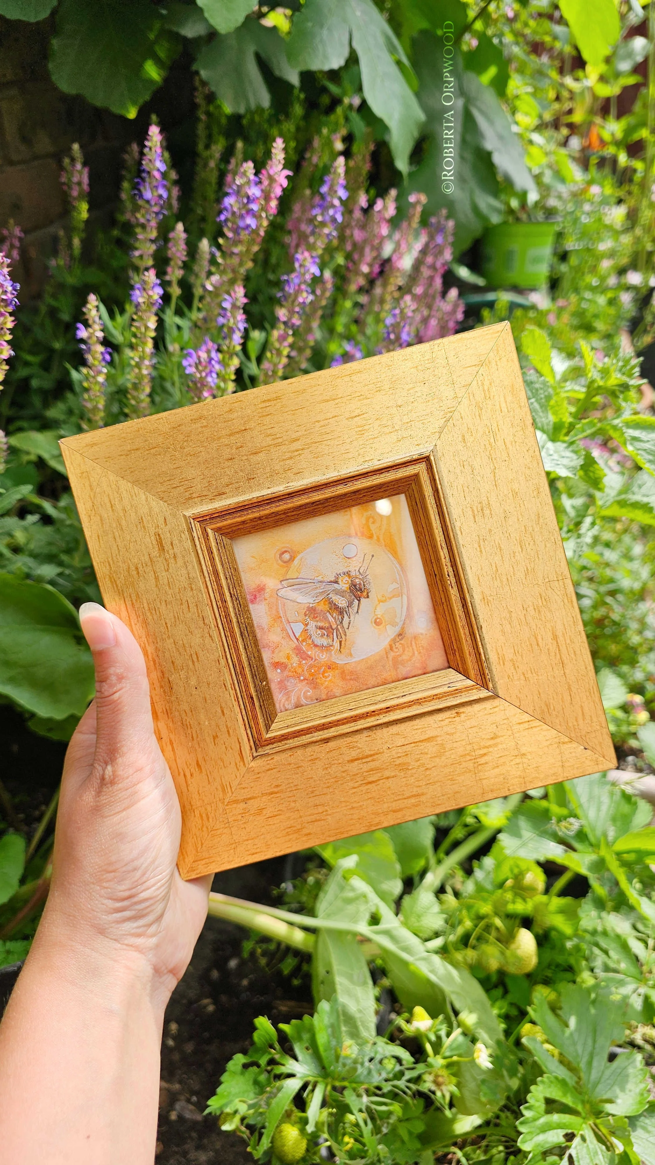 Bumble Bee watercolour painting in gold frame in the garden.jpg