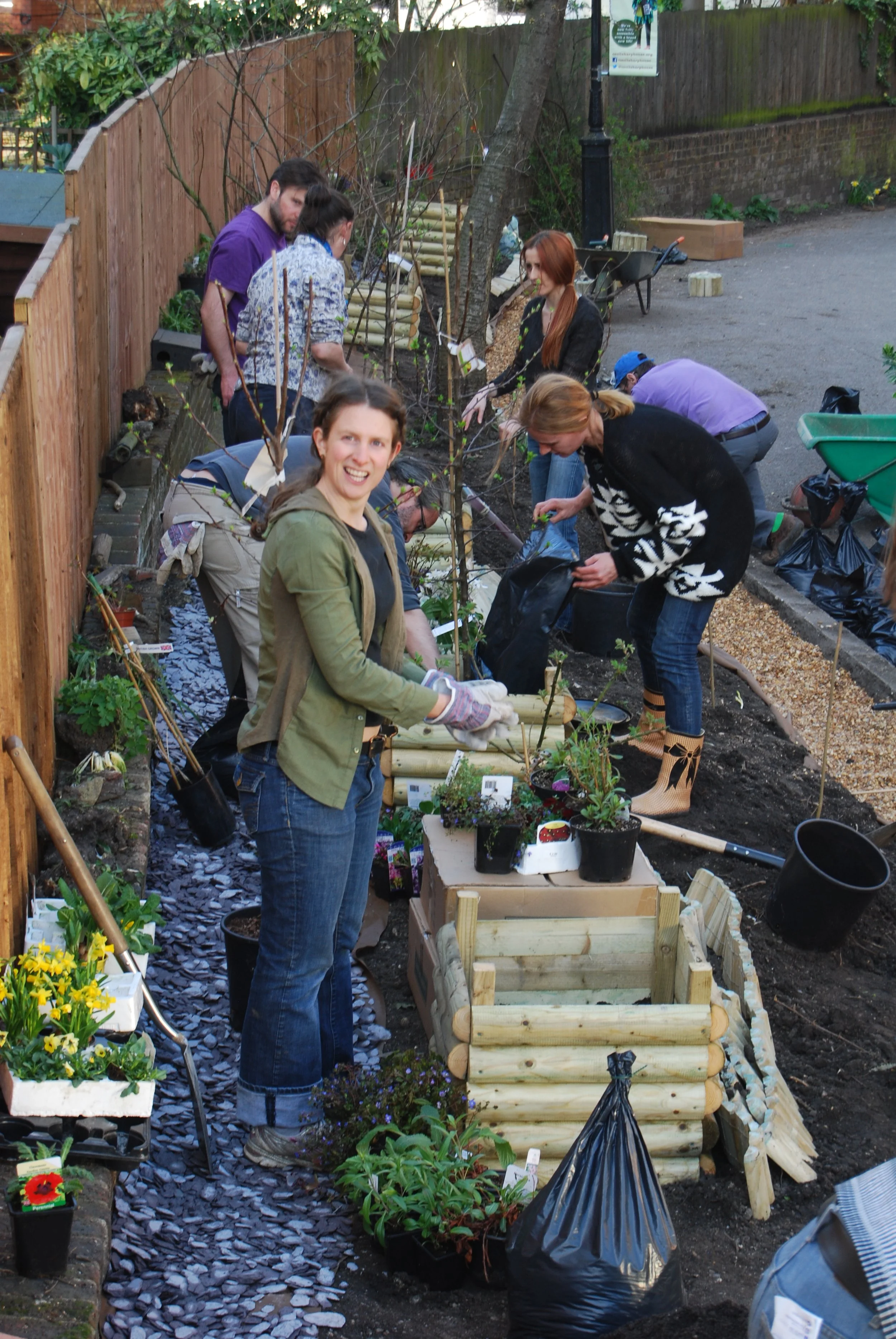 At the first permablitz at Cecil Sharp House on 14th March 2014 30 people transformed the entrance strip.