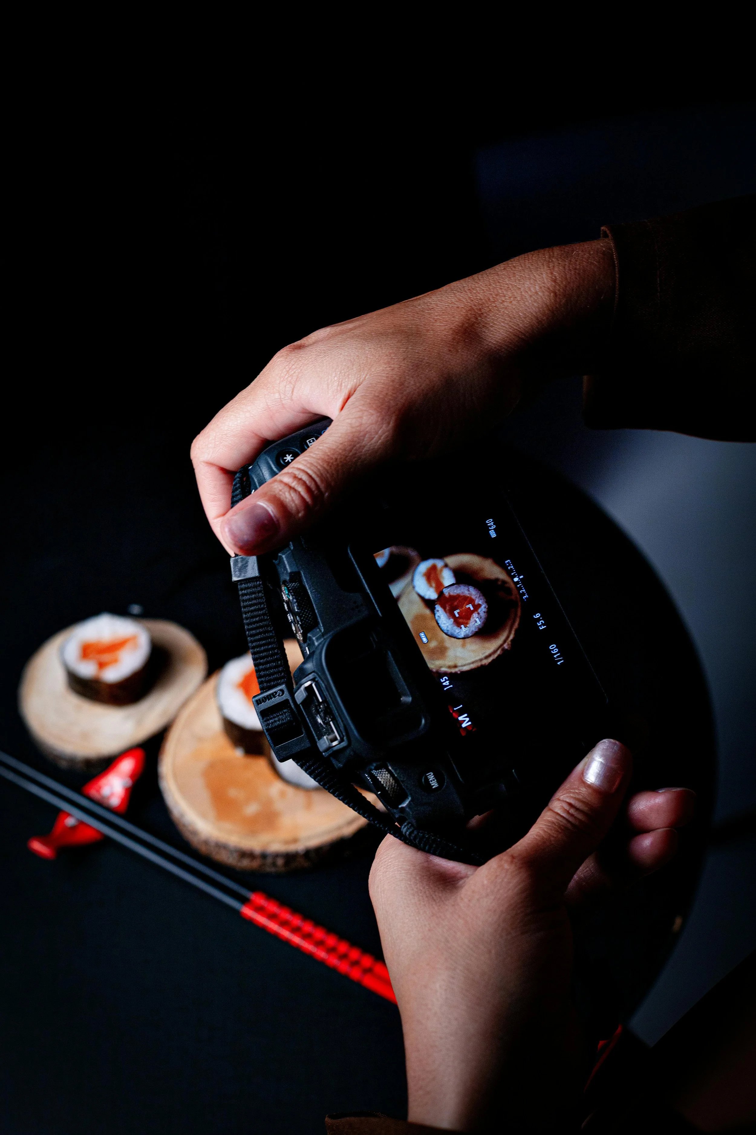 Behind the scenes food photography setup capturing sushi content for restaurant social media marketing and visual storytelling.