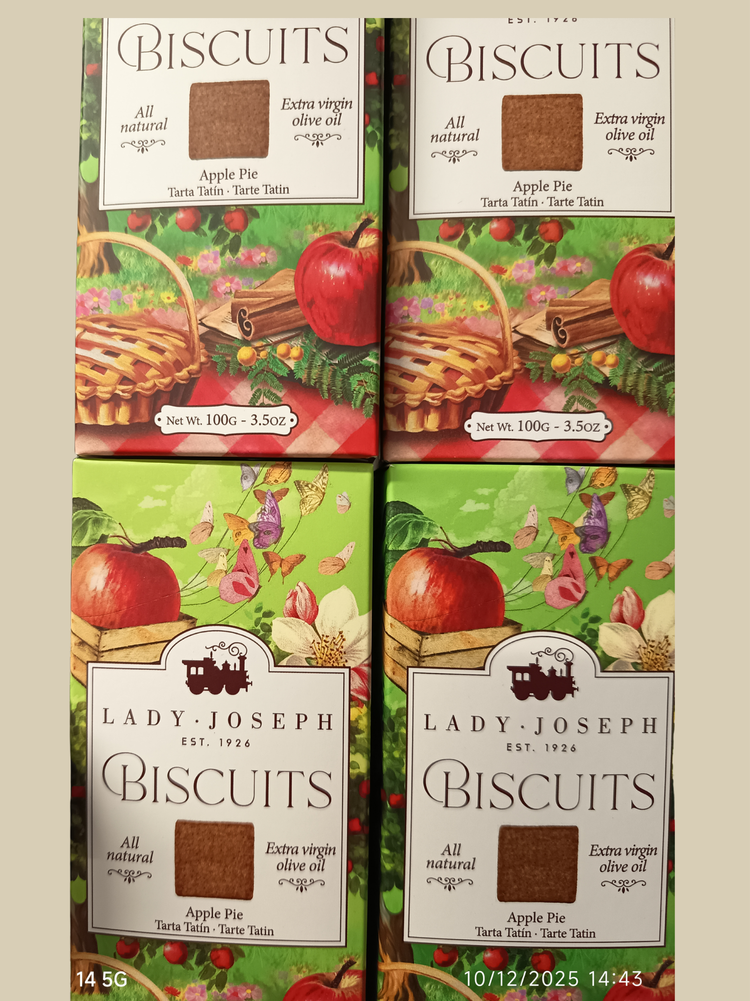 Paquets de biscuits Lady Joseph saveur tarte pomme, avec une illustration de pommes, fleurs et papillons, dans un design coloré et champêtre.