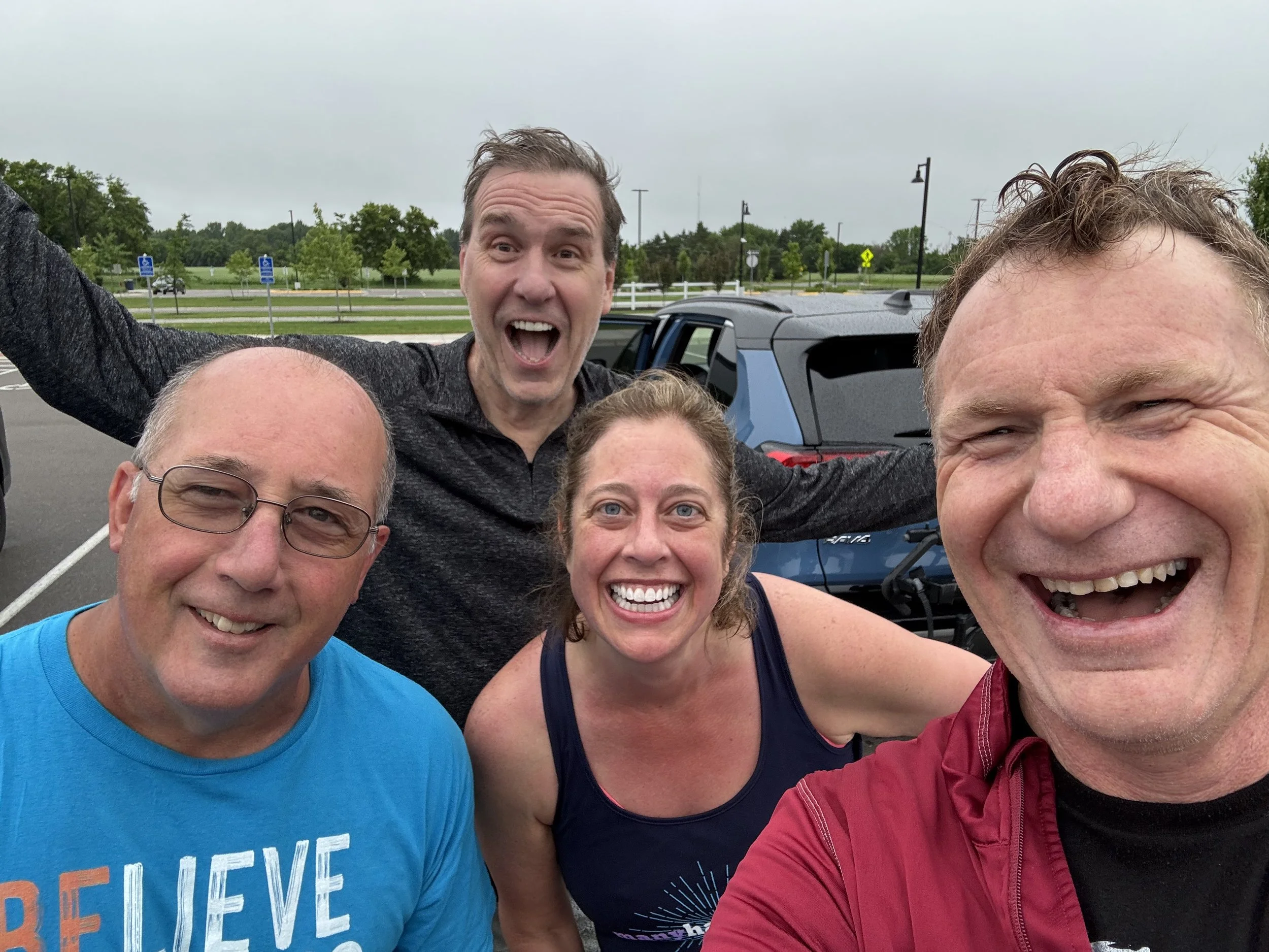 Coach Karin finishes a run and happens to see three TTMT swimmers finishing their open water training.