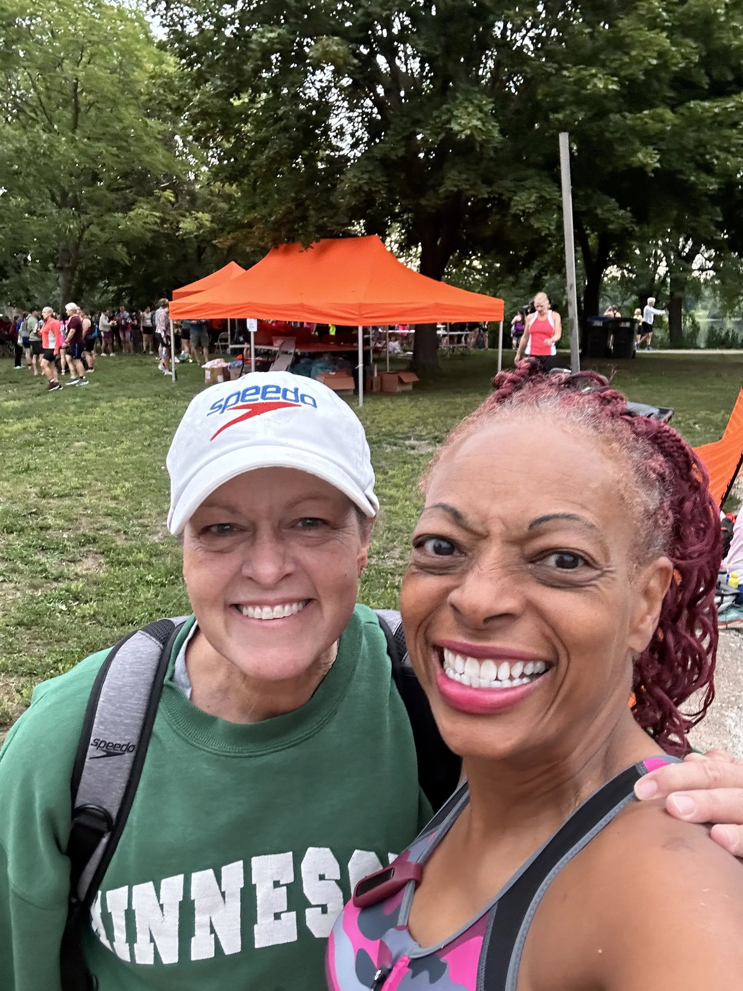 Coach Michelle supports a Beginner swimmer at her first triathlon.