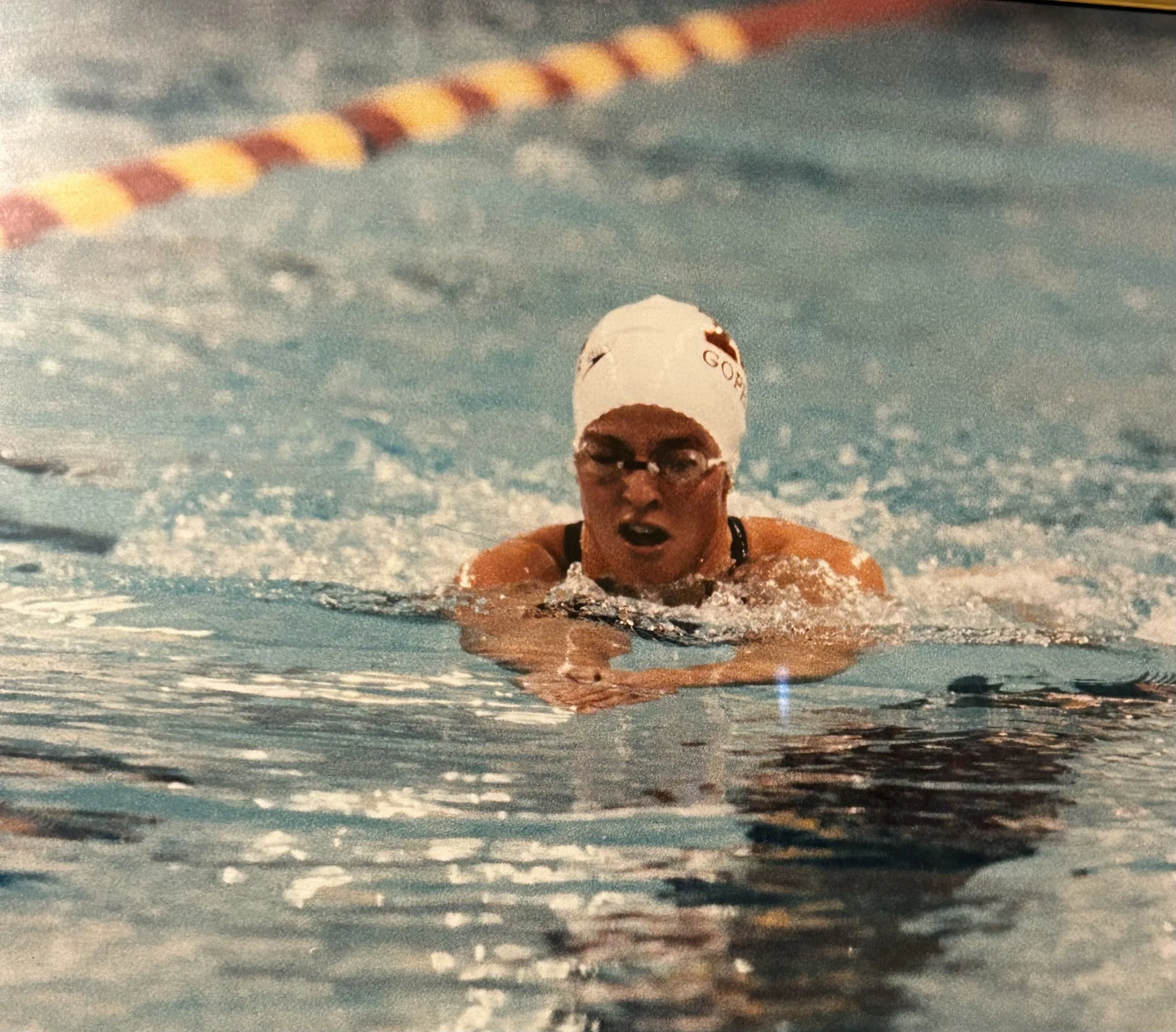 Do you recognize this fierce U of MN swimmer? It's Coach Michelle!