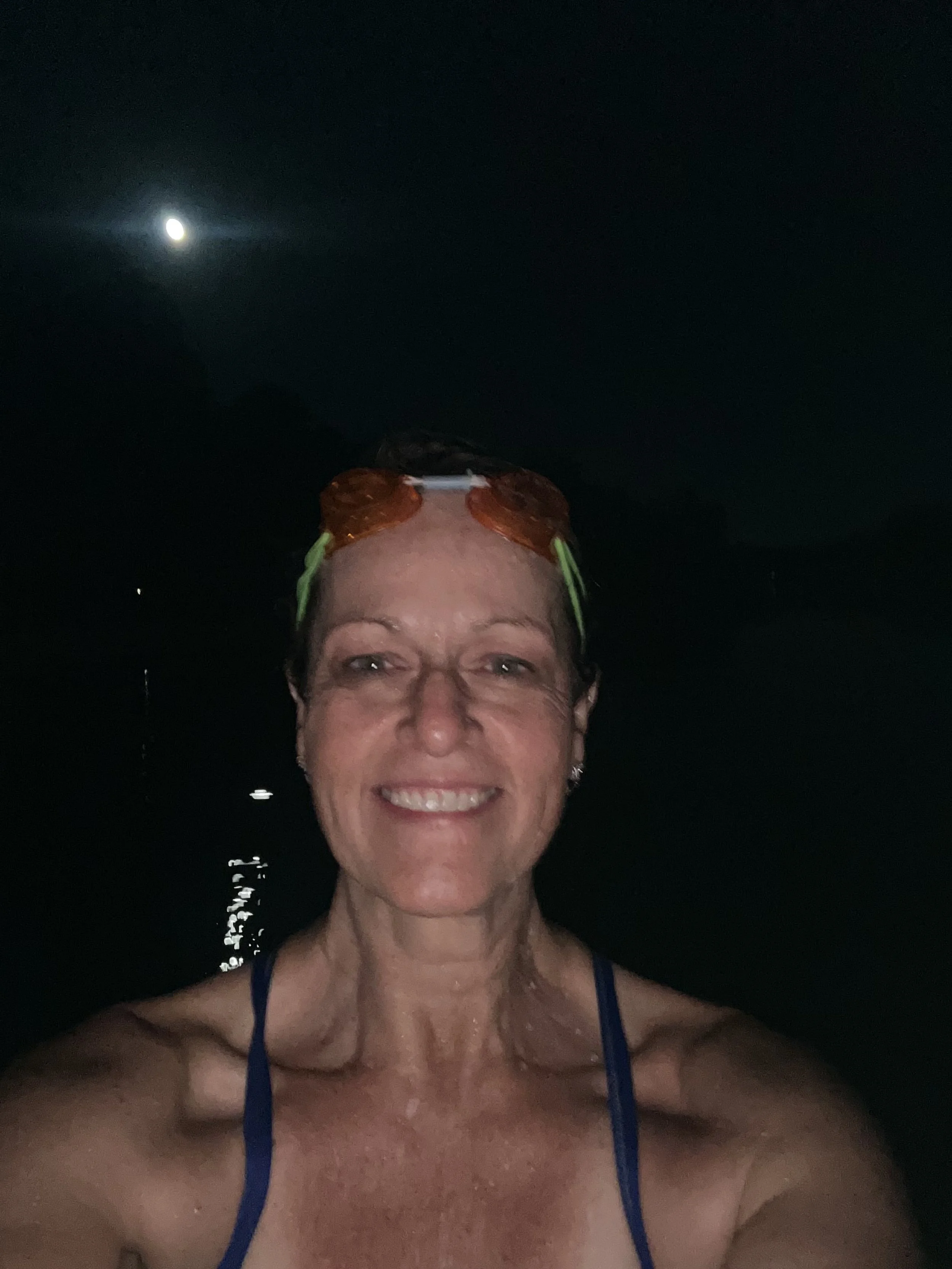As the truly mystical nautical creature that she is, Coach Michelle swims under the full moon.