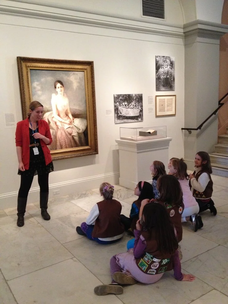 Scouts learning about Juliette Gordon Low, the founder of the Girl Scouts of the USA