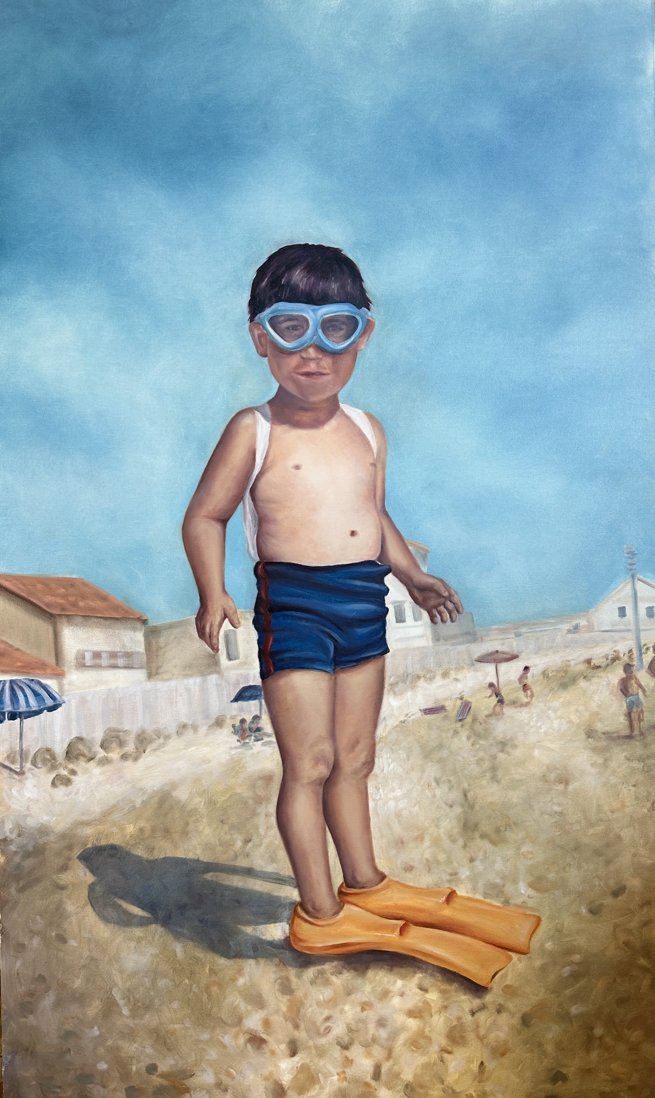 A painting of a young boy standing on a sandy beach with buildings and beach umbrellas in the background. He is wearing swimming goggles, blue swim shorts with red stripes, orange floaties on his feet, and a white tank top. The sky is blue with some clouds.