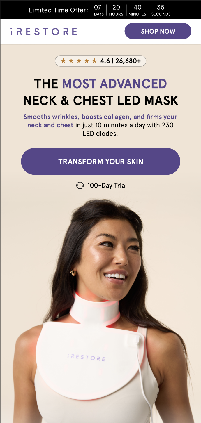 A smiling woman wearing a neck and chest LED mask from iRestor, designed for skincare. The mask emits a faint pink glow and is branded with iRestor. The application promotes collagen boosting and wrinkle smoothing in a 10-minute daily routine.