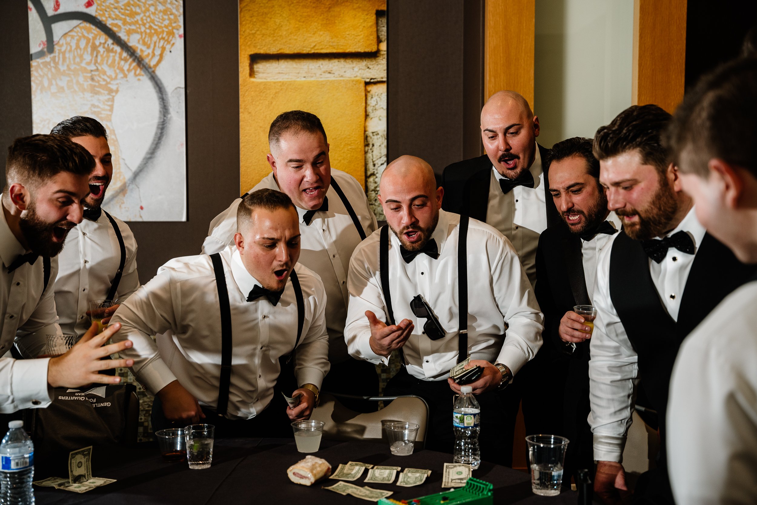 Groomsmen play games before the Wedding Day festivities at a Chicago Wedding.