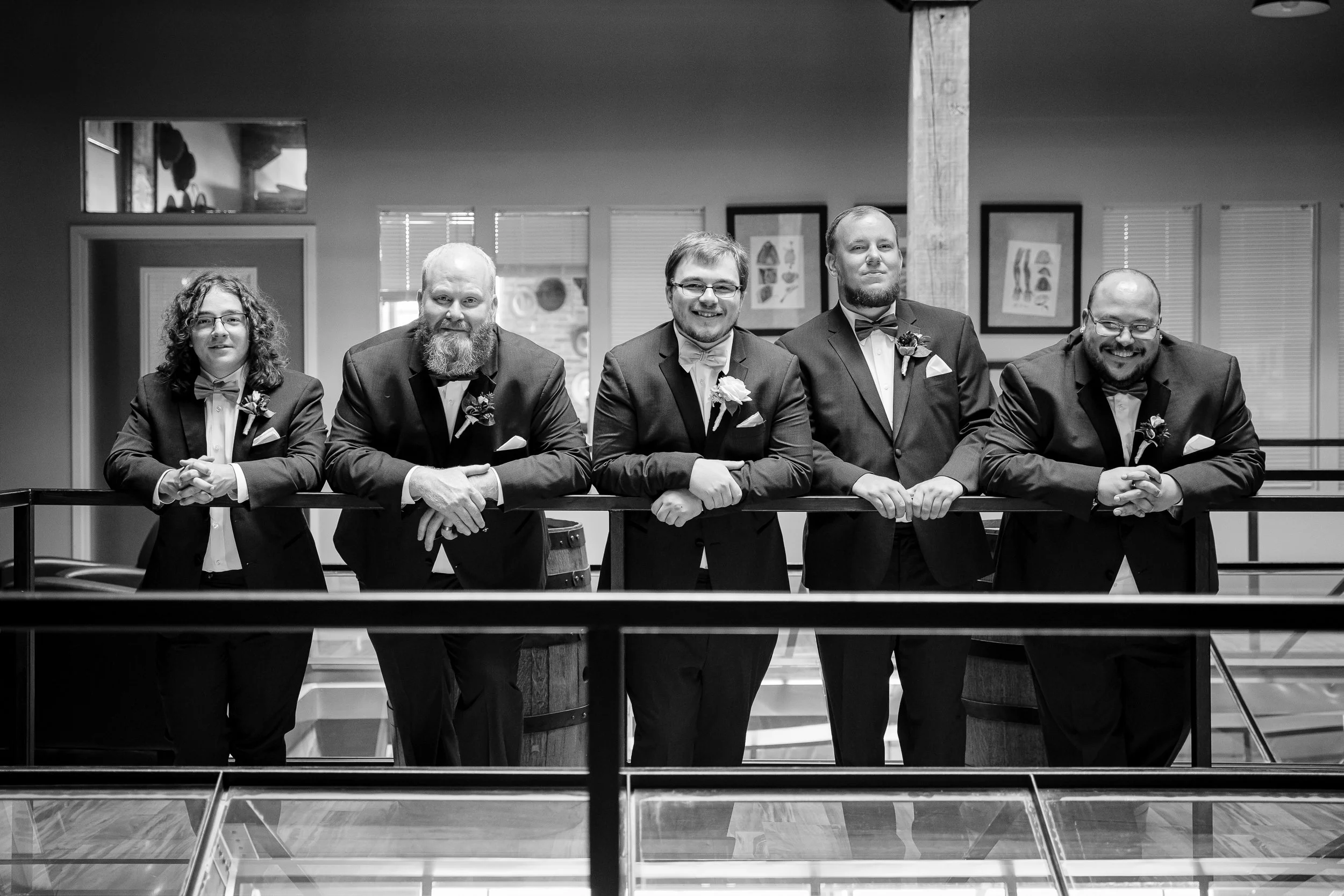 Groomsmen relax for a some photos before a wedding ceremony in Harvard, IL