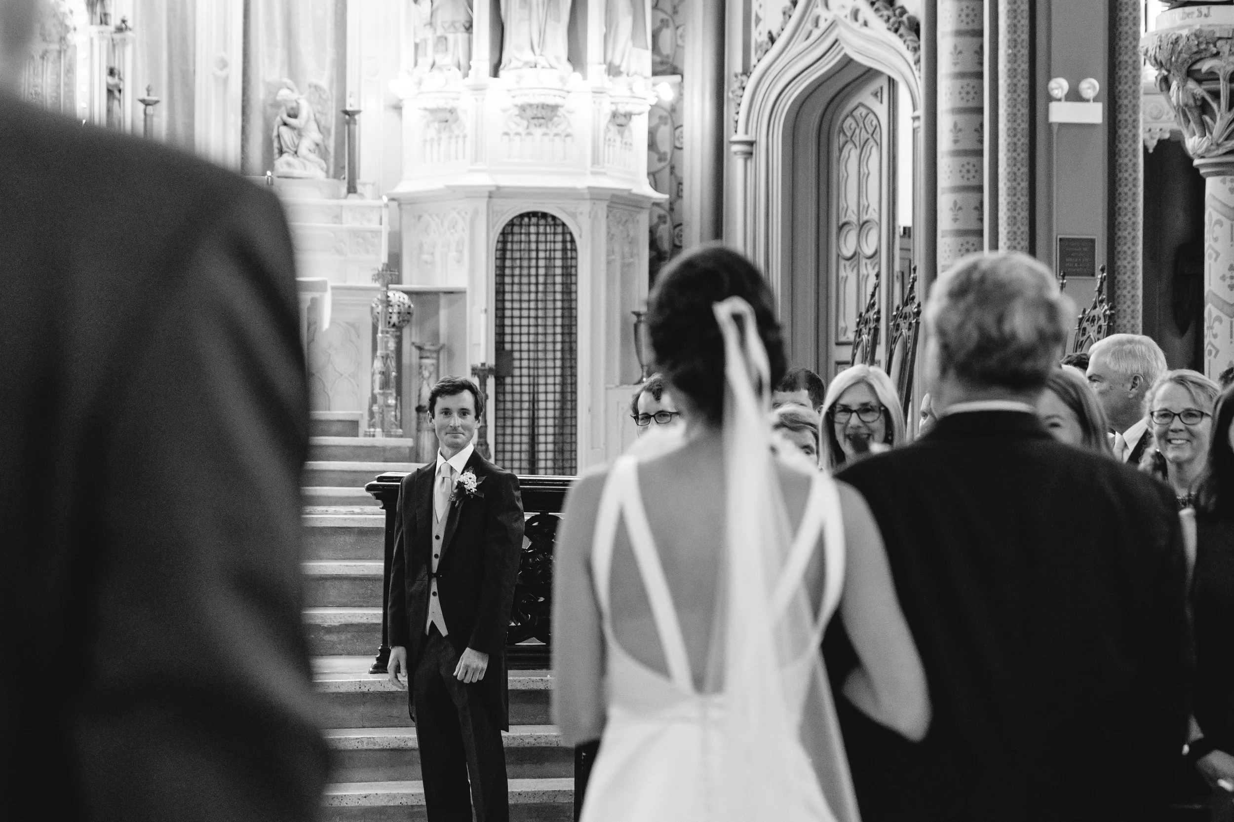 A grooms first glance at his bride during thier Wedding Ceremony in Chicago, IL