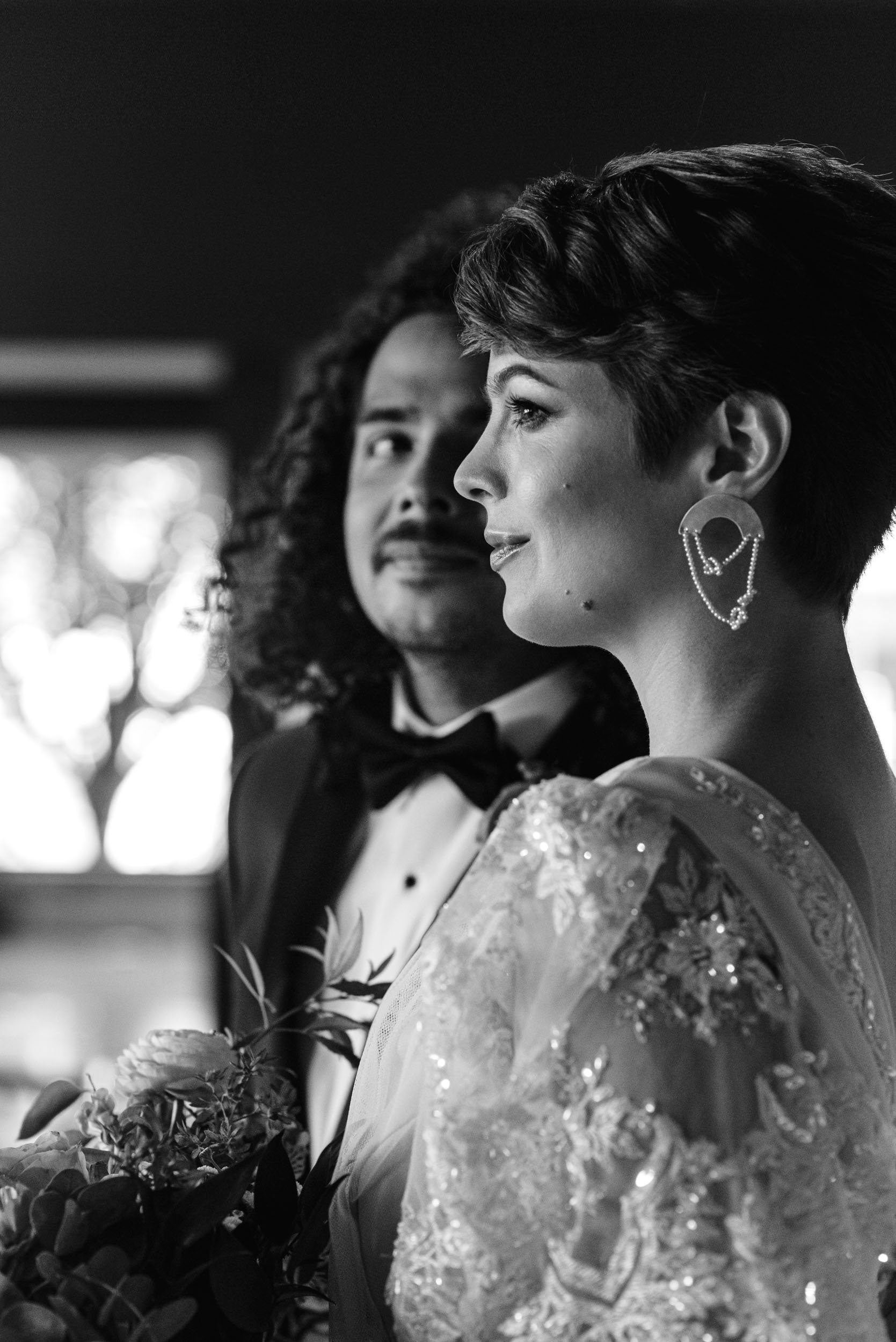 Black and White image of a Groom taking in his bride at the Walden in Chicago, IL