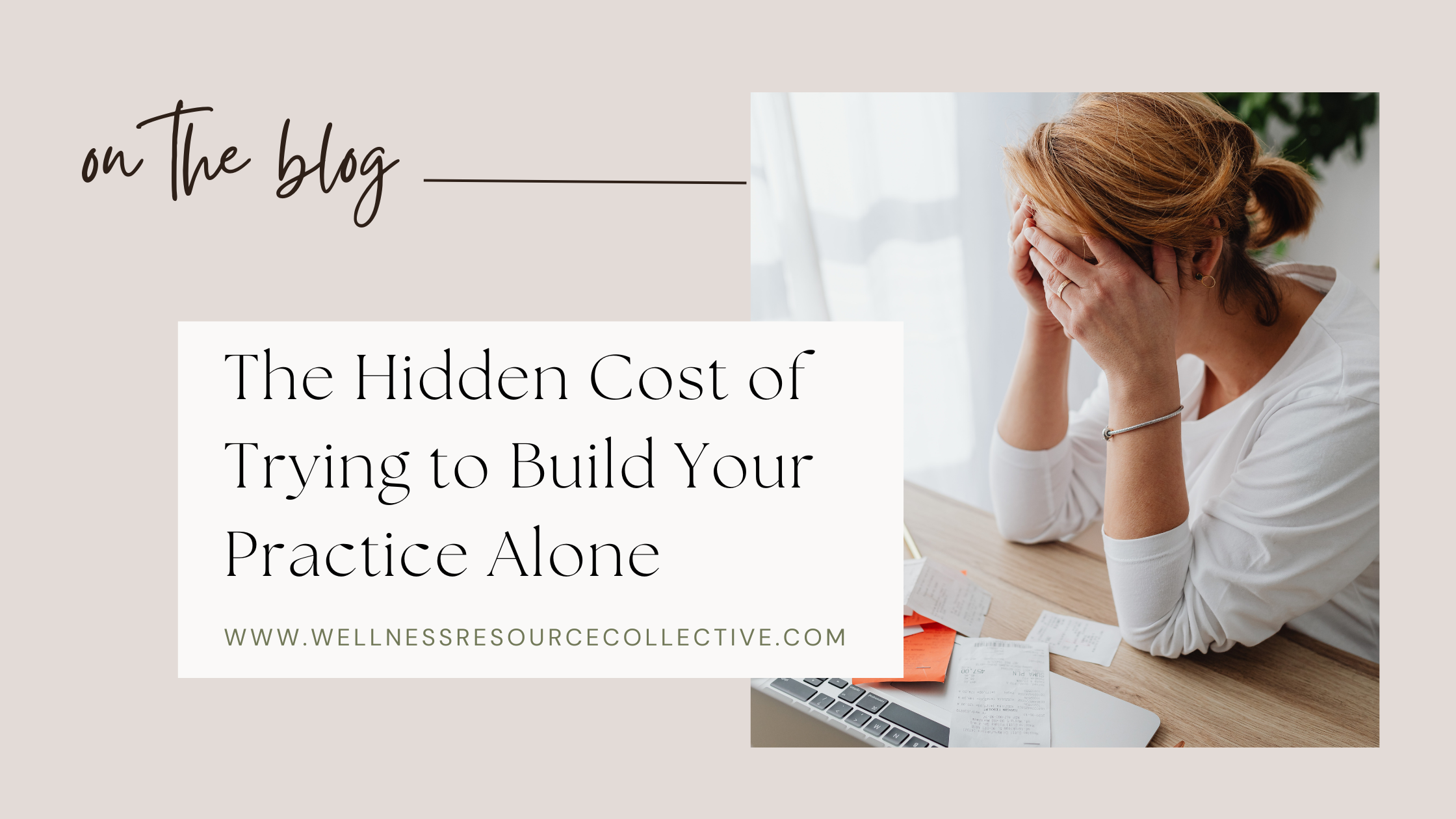 Woman sitting at desk with head in hands surrounded by papers — blog post about the hidden cost of building your wellness practice alone
