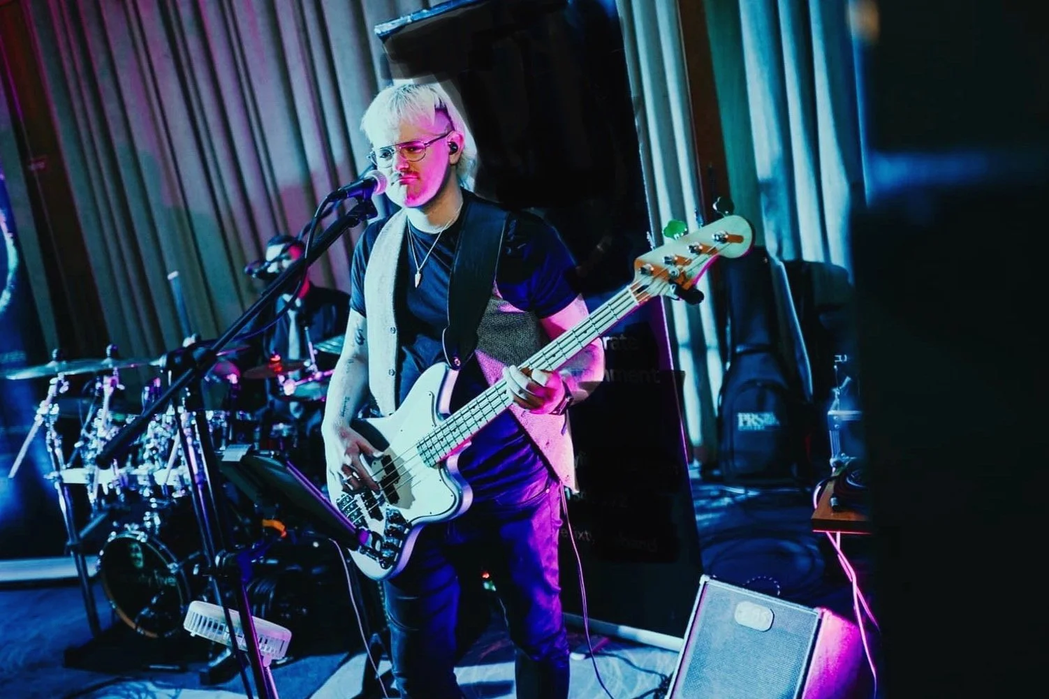 Bass guitar teacher giving lessons in Galway to student