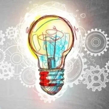 Bombilla de luz con engranajes en el fondo