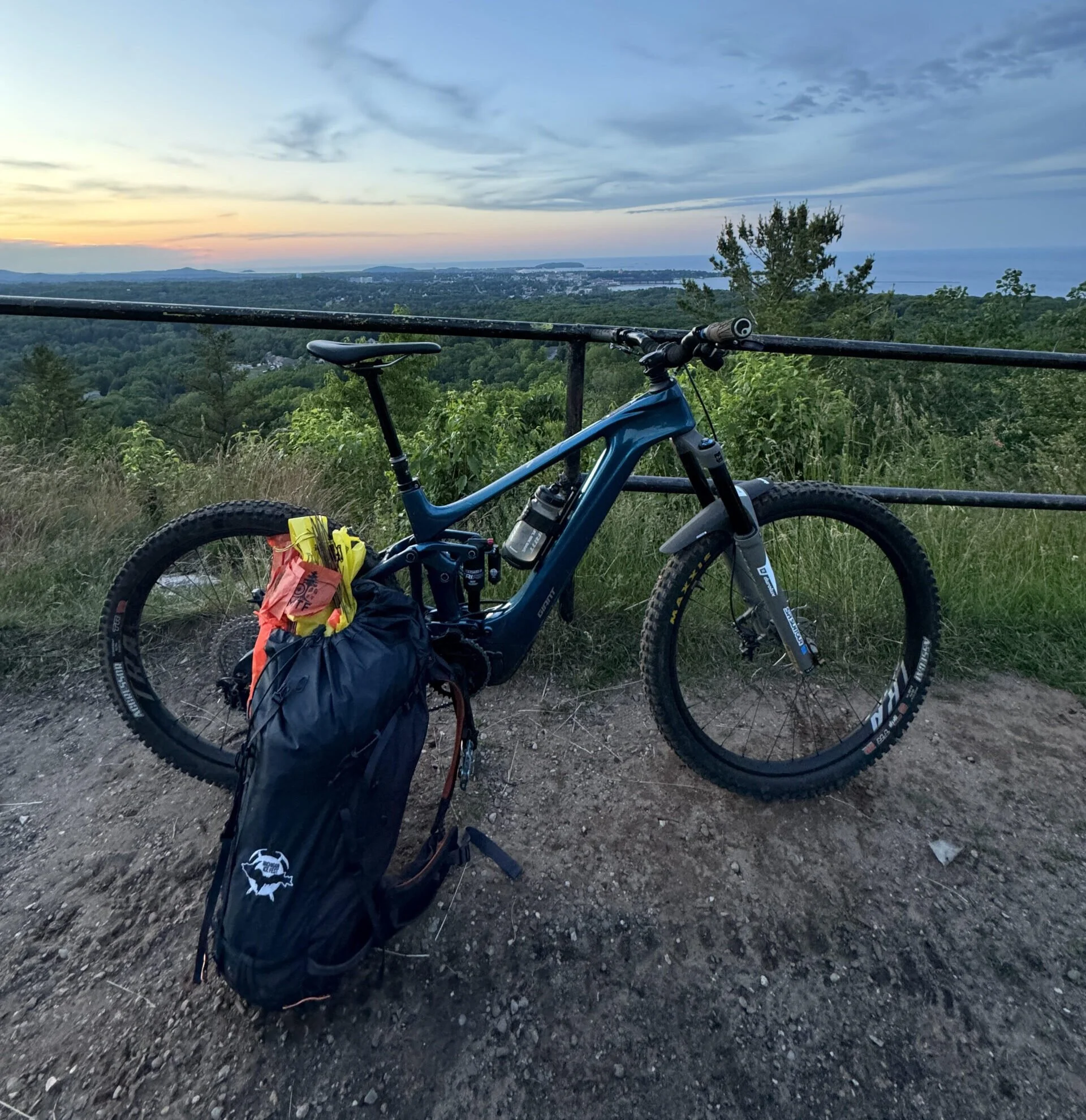 Bike on top of Mount Marquette with marking materials in bag