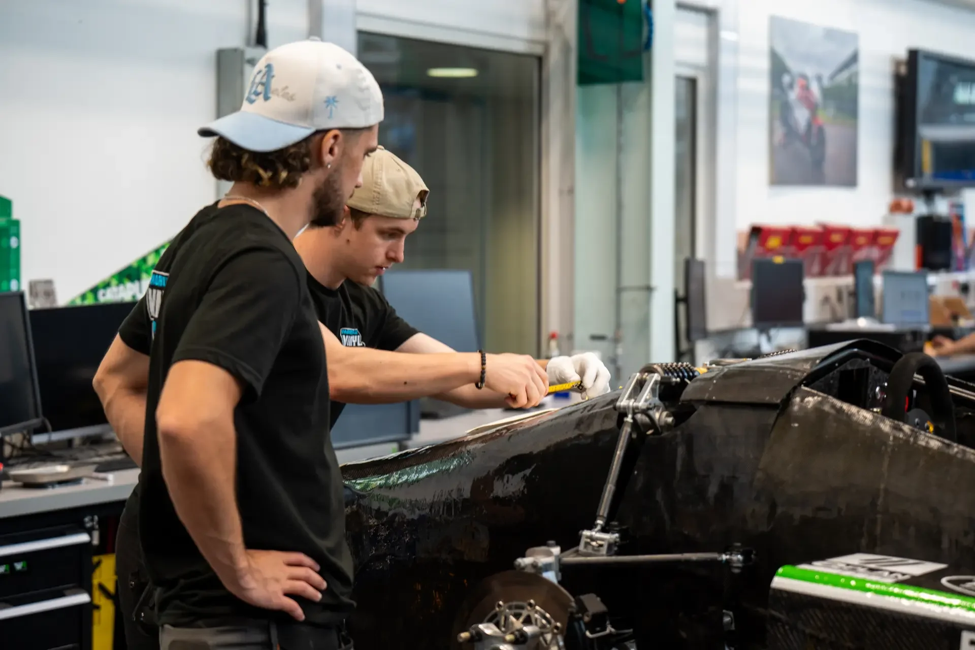 Morgwell signs installing a vehicle wrap