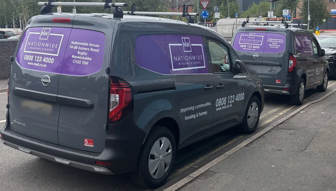 Van fleet branding and sign writing with purple wrapped elements