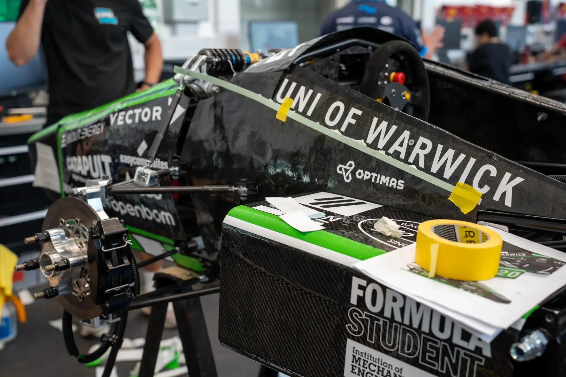 Warwick racing motorsport livery being installed 