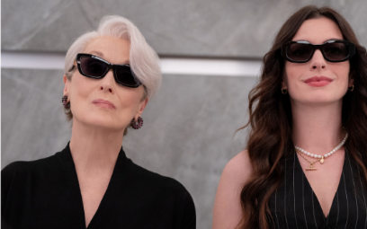 Miranda and Andy standing next to one another in the elevator looking poised in "The Devil Wears Prada 2"