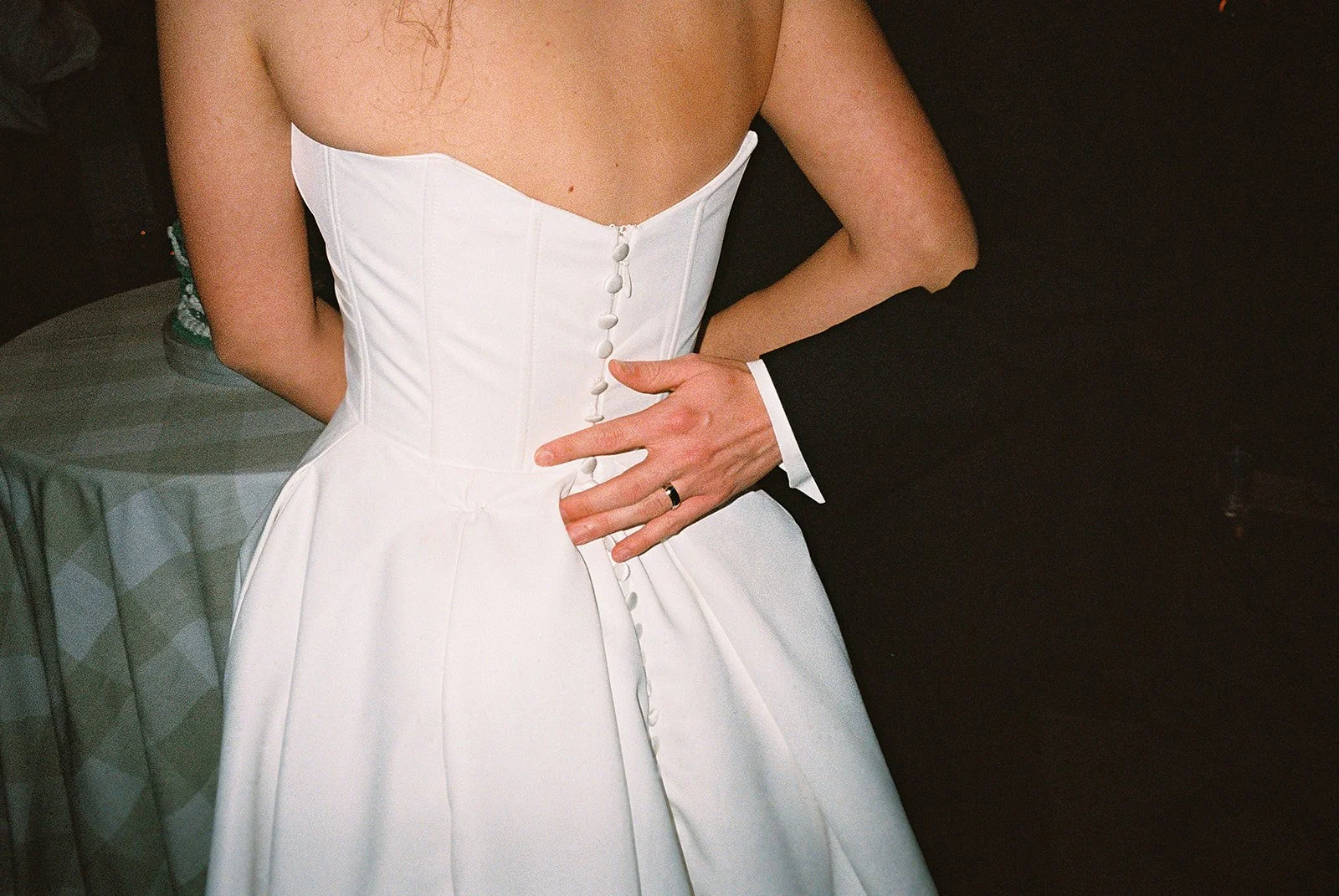 Bride and groom get married in Chicago at WildmanBT, with creative, lively wedding focused on community, family, laughter. Documentary and candid photos on flash film. Weddings by Grace is a Chicago lesbian queer luxury wedding photographer specializ