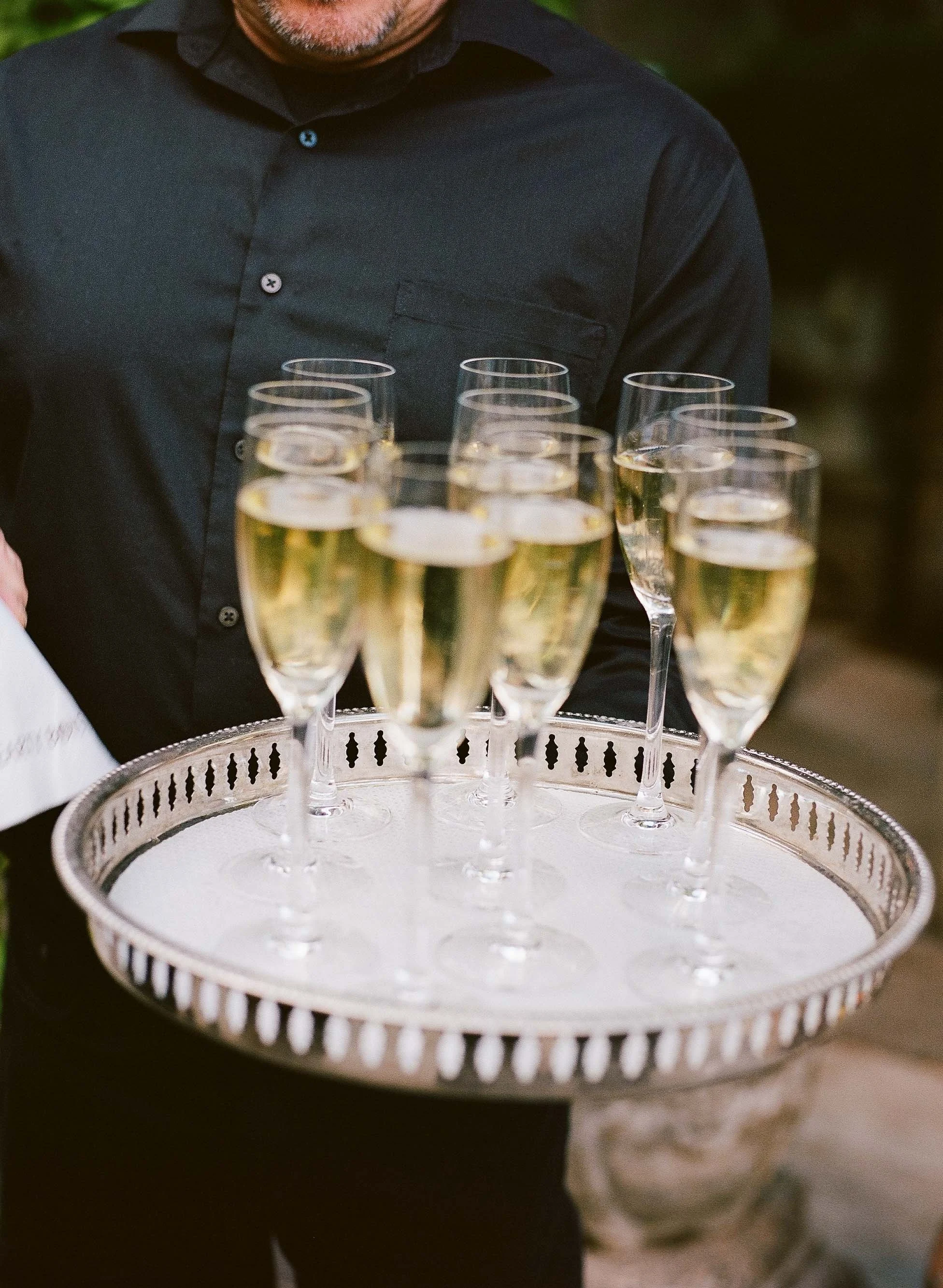 Bride and groom get married in Chicago at Salvage One, with creative, lively wedding focused on community, family, laughter. Documentary and candid photos on analog nostalgic film. Weddings by Grace is a Chicago lesbian queer luxury wedding photograp