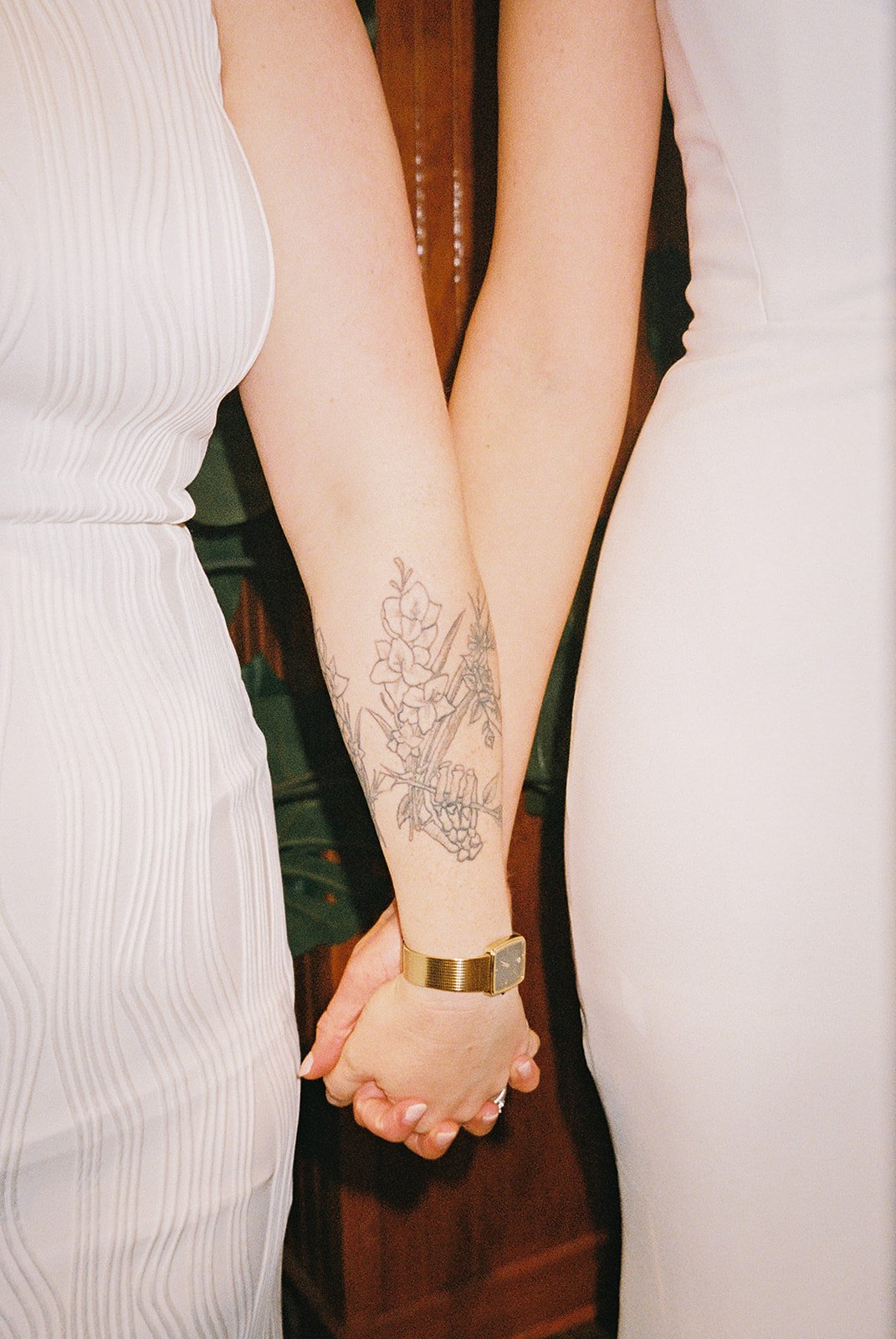 Fun flash photos of lesbian wedding at Dorothy bar. Documentary and candid photos on flash film. Weddings by Grace is a Chicago lesbian queer luxury wedding photographer specializing in portraits, candid, editorial, documentary, + artistic images wit
