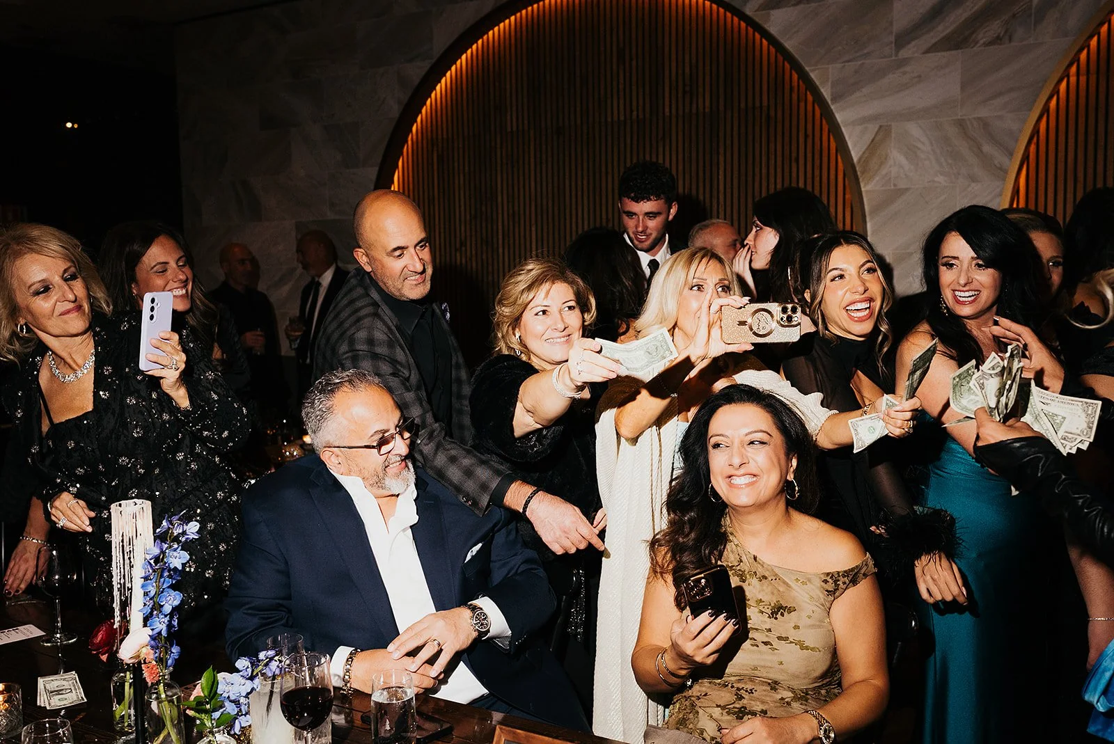 Two grooms get married downtown on Halloween night at chicago winery. Queer, gay, black tie, high-end party and drag show. Documentary and candid photos on flash film. Weddings by Grace is a Chicago lesbian queer luxury wedding photographer specializ