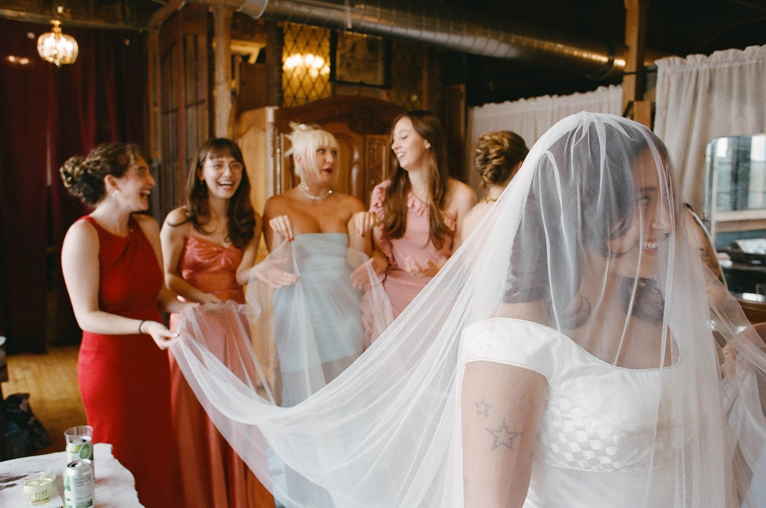 Bride and groom get married in Chicago at Salvage One, with creative, lively wedding focused on community, family, laughter. Documentary and candid photos on analog nostalgic film. Weddings by Grace is a Chicago lesbian queer luxury wedding photograp