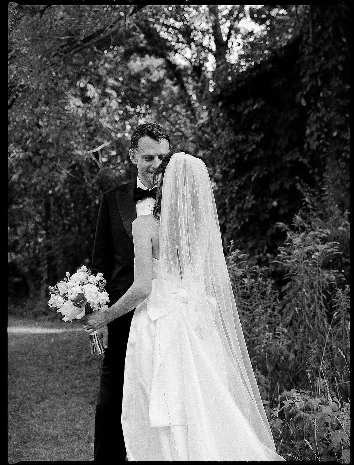 Bride and groom get married at the Millcreek Wilde in St. Joseph, Michigan. Grace Coudal is a Chicago lesbian photographer specializing in portraits, candid, editorial, documentary, events, + weddings. Analog film wedding photography, queer-owned.
