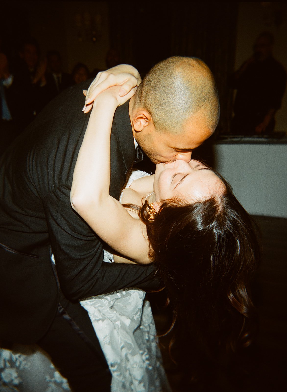 candid flash dance floor photos. Bride and Groom marry at Lincoln Park Conservatory and Salvatores. Grace Coudal is a Chicago lesbian photographer specializing in portraits, candid, editorial, documentary, events, + weddings. Analog film wedding phot