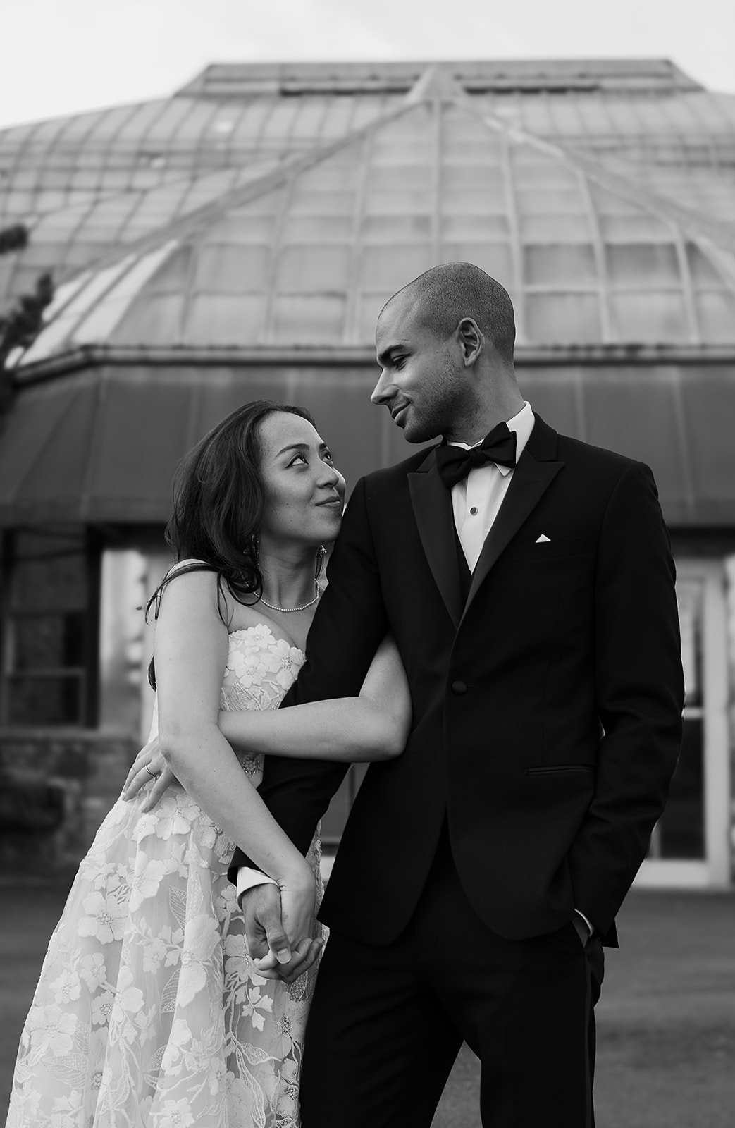 black and white portraits of Bride and Groom get married at Lincoln Park Conservatory and Salvatores. Grace Coudal is a Chicago lesbian photographer specializing in portraits, candid, editorial, documentary, events, + weddings. Analog film wedding ph