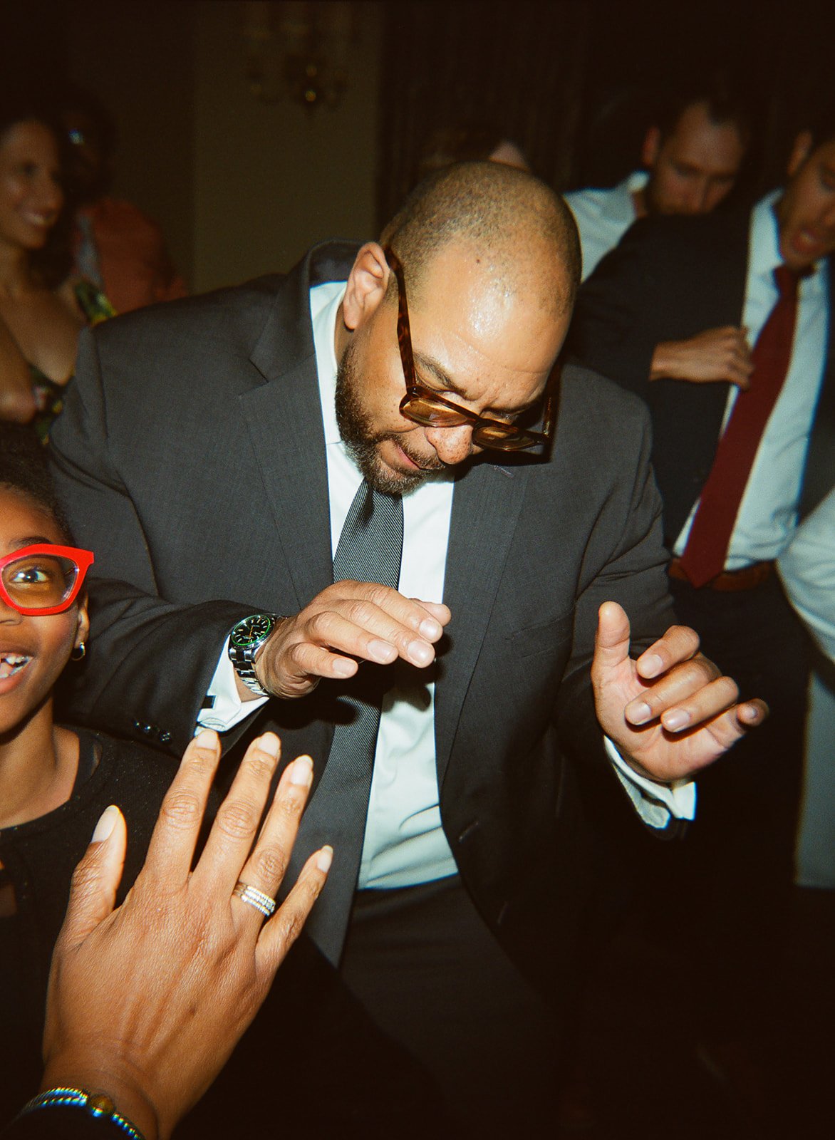 candid flash dance floor photos. Bride and Groom marry at Lincoln Park Conservatory and Salvatores. Grace Coudal is a Chicago lesbian photographer specializing in portraits, candid, editorial, documentary, events, + weddings. Analog film wedding phot