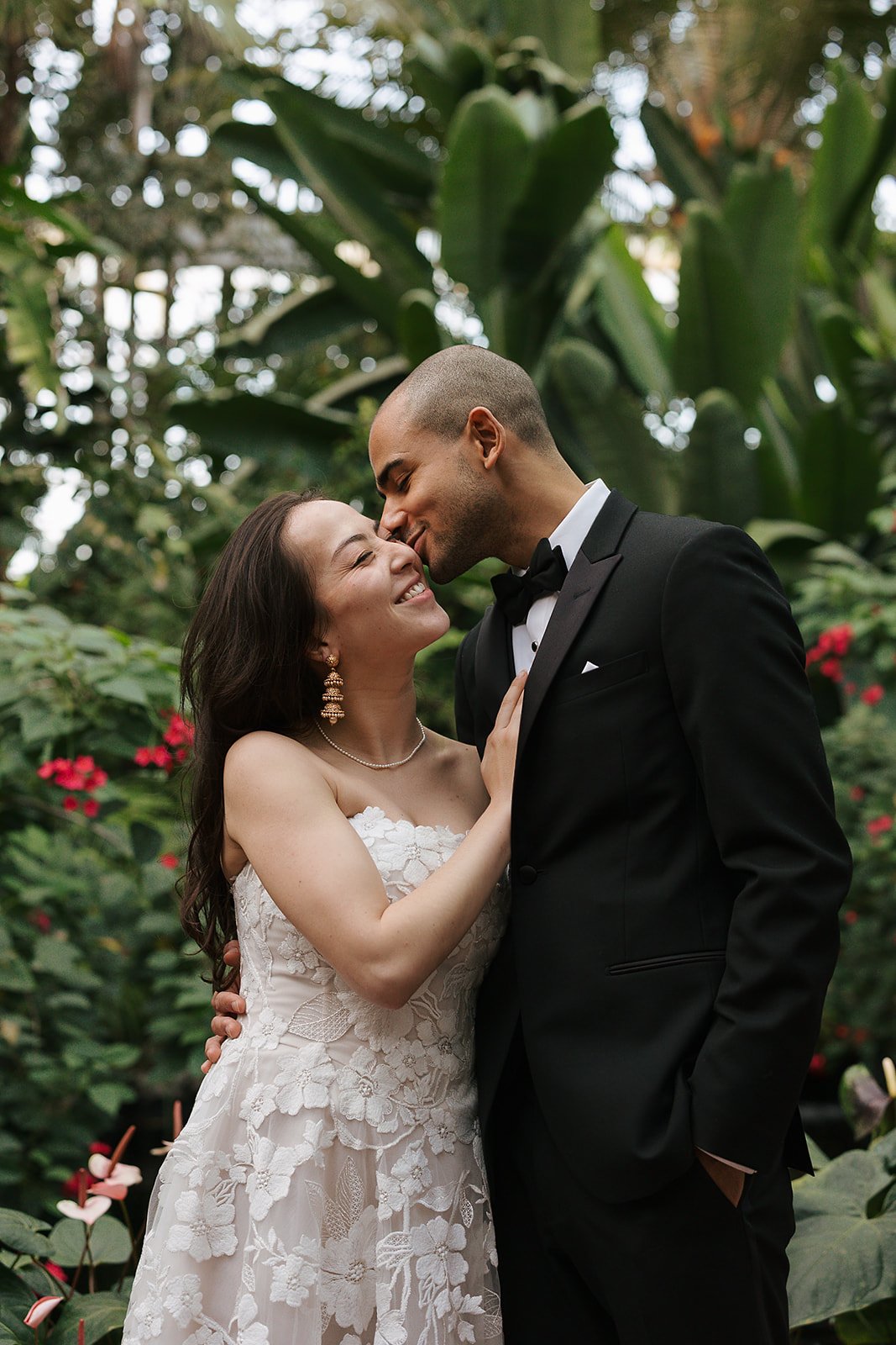 portraits of Bride and Groom get married at Lincoln Park Conservatory and Salvatores. Grace Coudal is a Chicago lesbian photographer specializing in portraits, candid, editorial, documentary, events, + weddings. Analog film wedding photography, queer