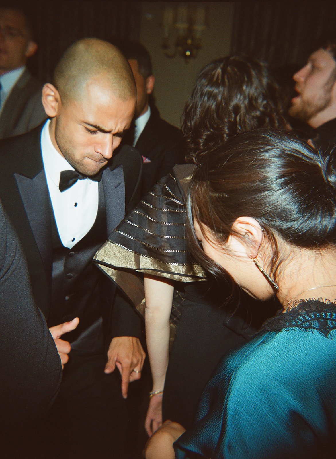 candid flash dance floor photos. Bride and Groom marry at Lincoln Park Conservatory and Salvatores. Grace Coudal is a Chicago lesbian photographer specializing in portraits, candid, editorial, documentary, events, + weddings. Analog film wedding phot