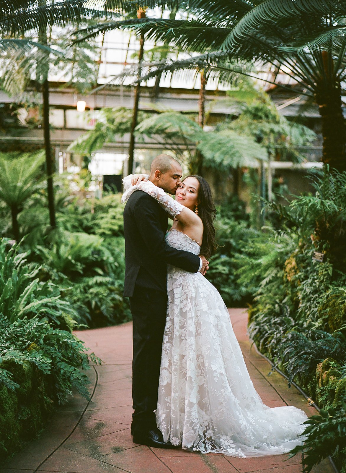 portraits of Bride and Groom get married at Lincoln Park Conservatory and Salvatores. Grace Coudal is a Chicago lesbian photographer specializing in portraits, candid, editorial, documentary, events, + weddings. Analog film wedding photography, queer