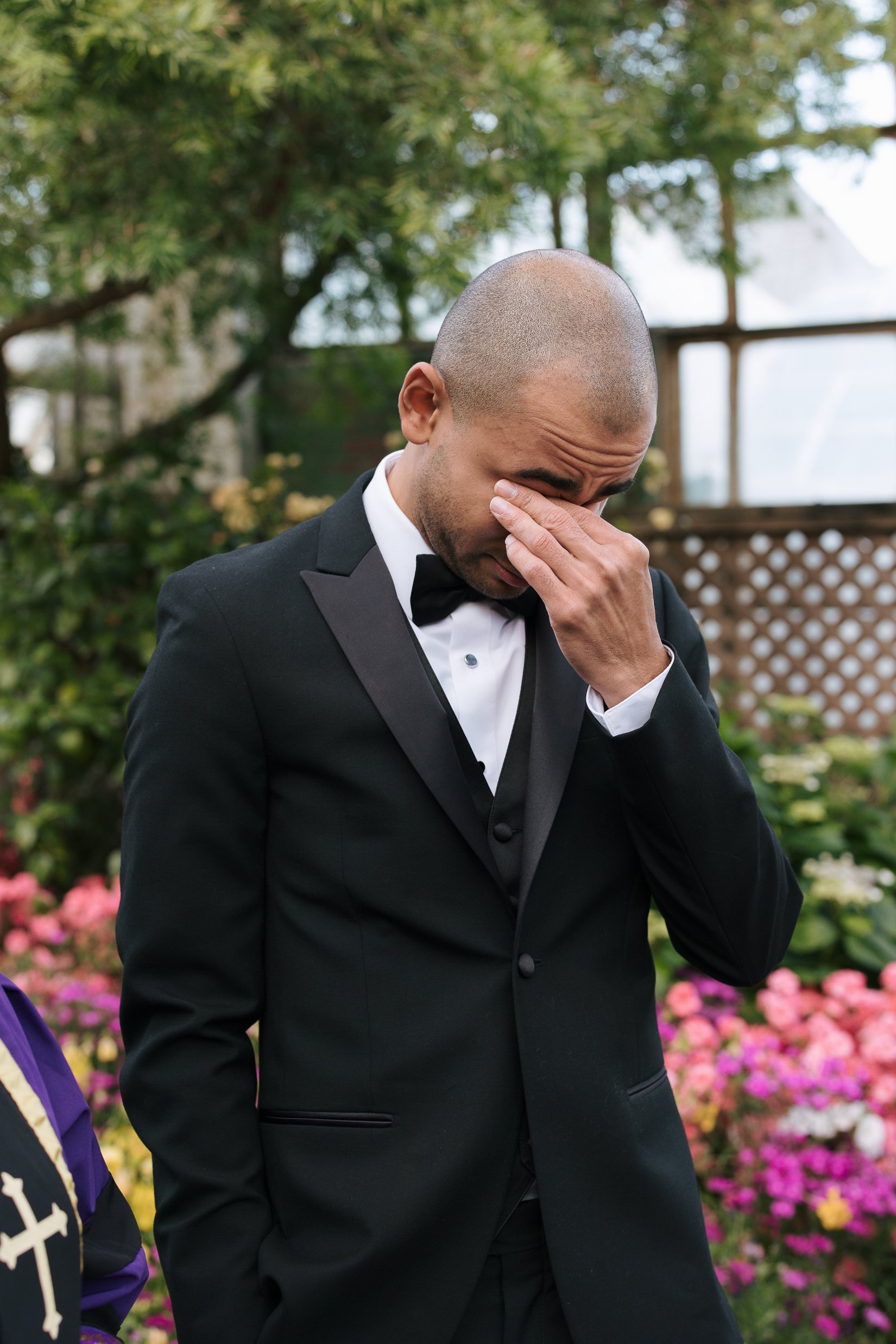 groom cries as bride walks down the aisle. Bride and Groom get married at Lincoln Park Conservatory and Salvatores. Grace Coudal is a Chicago lesbian photographer specializing in portraits, candid, editorial, documentary, events, + weddings. Analog f