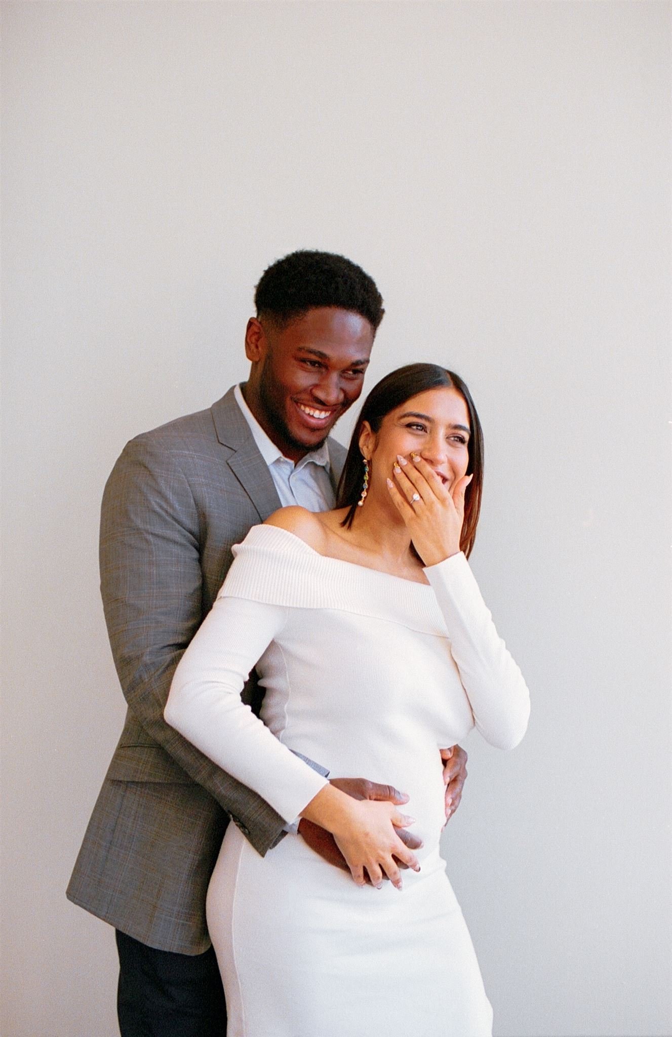Film photo of bride and groom eloping in Chicago City Hall. Grace Coudal is a Chicago lesbian photographer specializing in portraits, product, food, lifestyle, events, + weddings. Analog film photography, queer-owned.