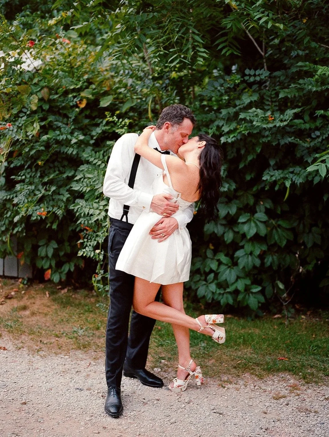 Bride and groom get married at the Millcreek Wilde in St. Joseph, Michigan. Grace Coudal is a Chicago lesbian photographer specializing in portraits, candid, editorial, documentary, events, + weddings. Analog film wedding photography, queer-owned.