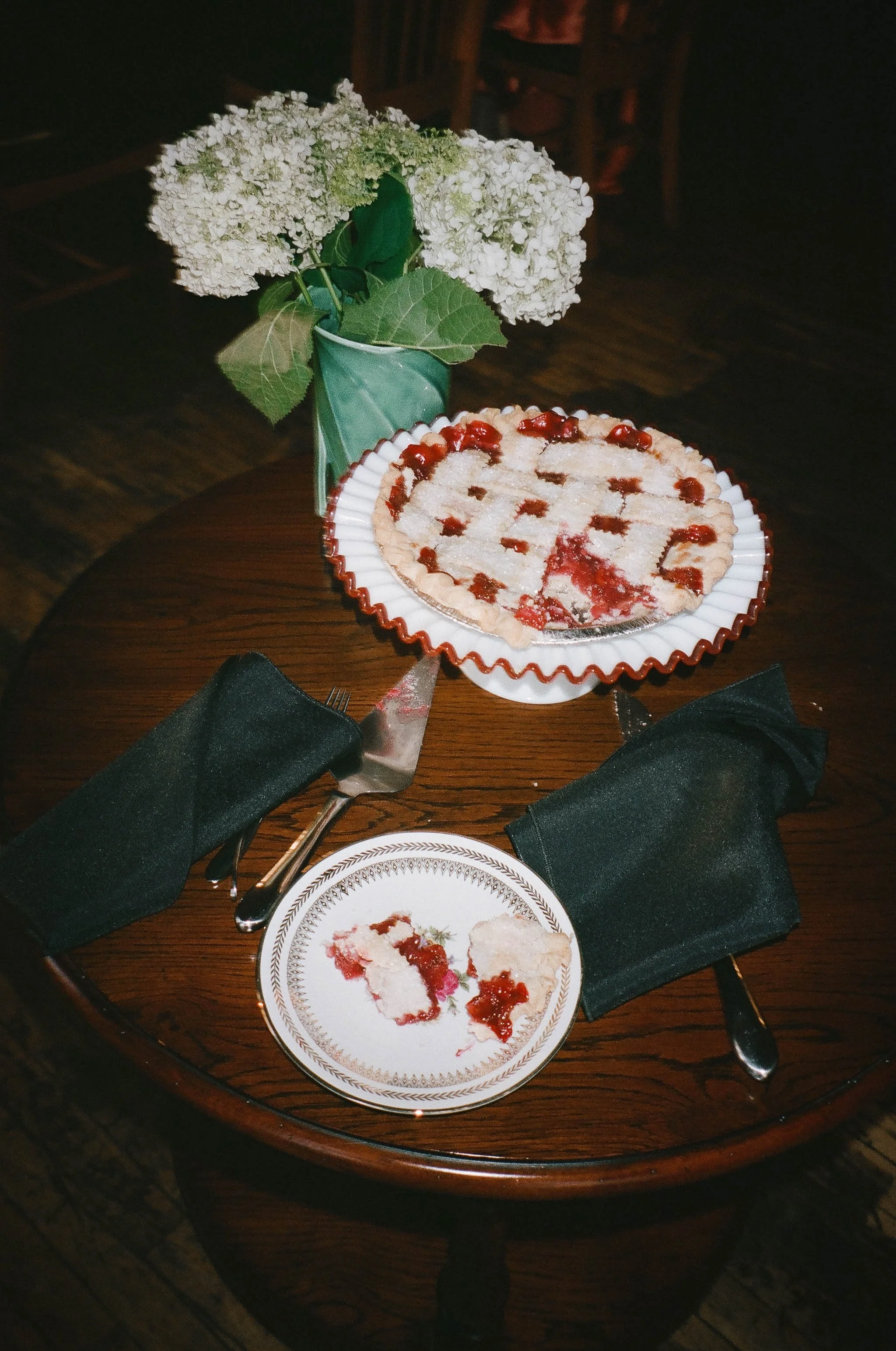 Bride and groom get married in Chicago at Salvage One, with creative, lively wedding focused on community, family, laughter. Documentary and candid photos on analog nostalgic film. Weddings by Grace is a Chicago lesbian queer luxury wedding photograp
